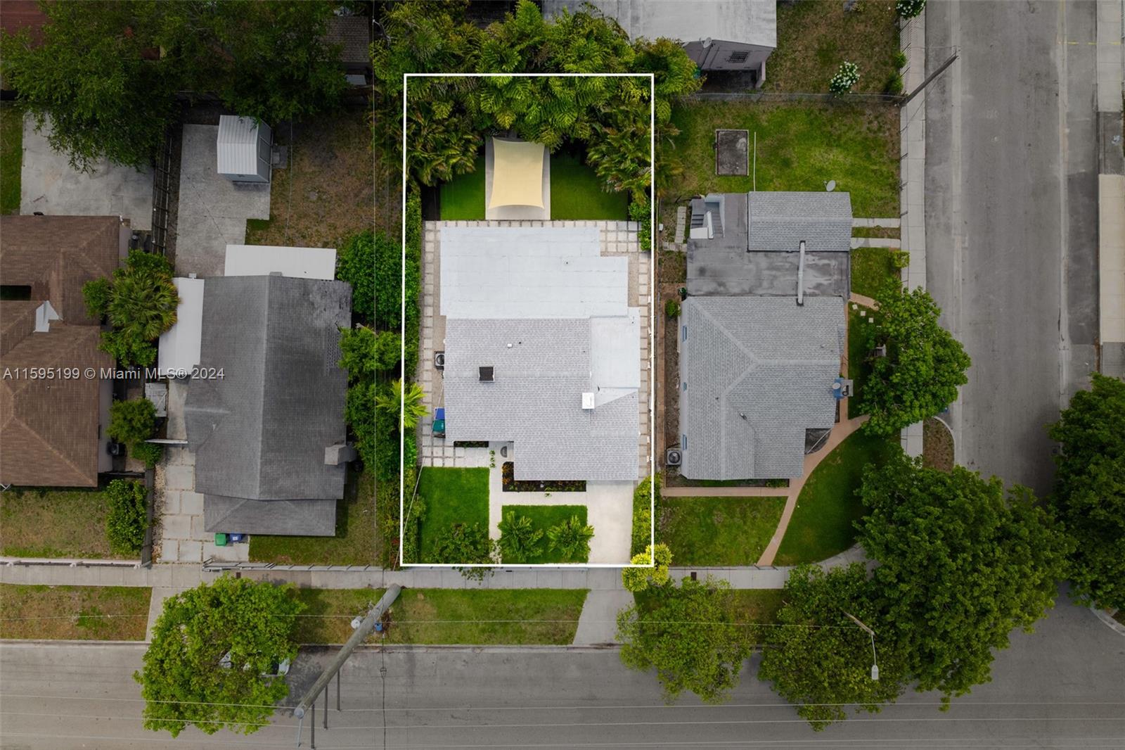 4420 Northwest 3rd Avenue Miami, FL 33127 - Photo 30 of 36 an aerial view of multiple houses with a yard