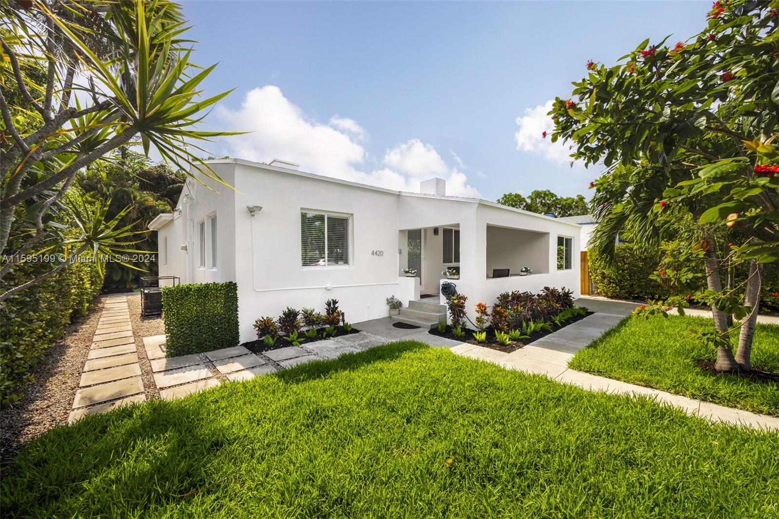 4420 Northwest 3rd Avenue Miami, FL 33127 - Photo 4 of 36 a front view of house with yard and green space