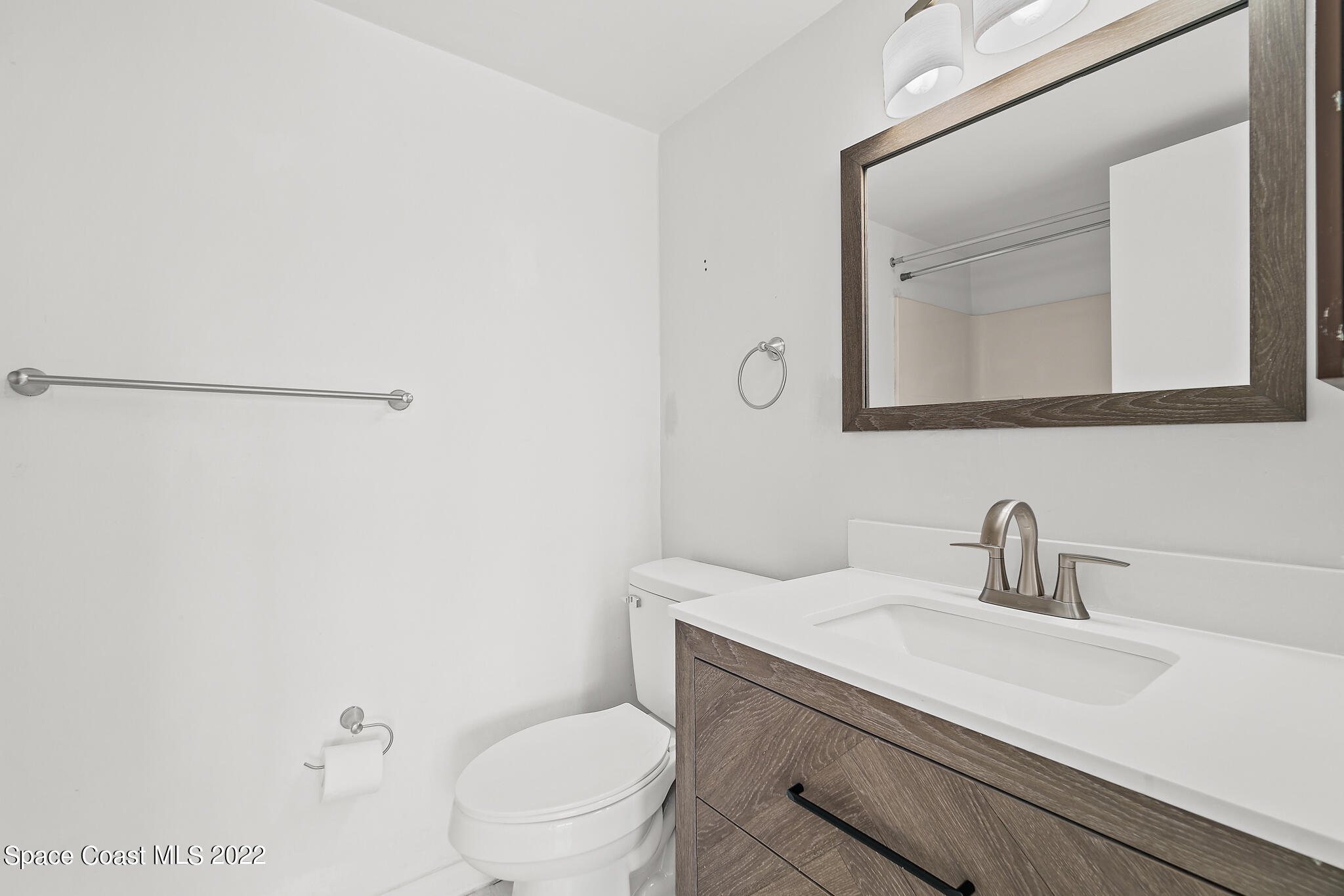 2727 North Wickham Road, Unit 1018 Melbourne, FL 32935 - Photo 12 of 21 Guest Bathroom