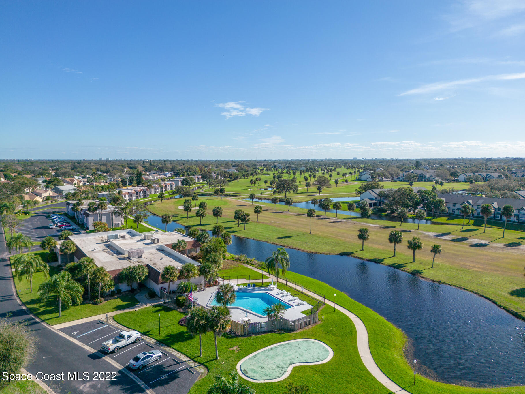 2727 North Wickham Road, Unit 1018 Melbourne, FL 32935 - Photo 13 of 21 Clubhouse, Pool & Putting Green
