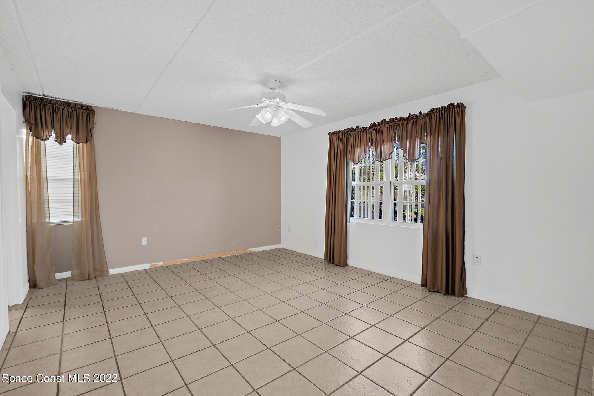 2727 North Wickham Road, Unit 1018 Melbourne, FL 32935 - Photo 8 of 21 Primary Bedroom