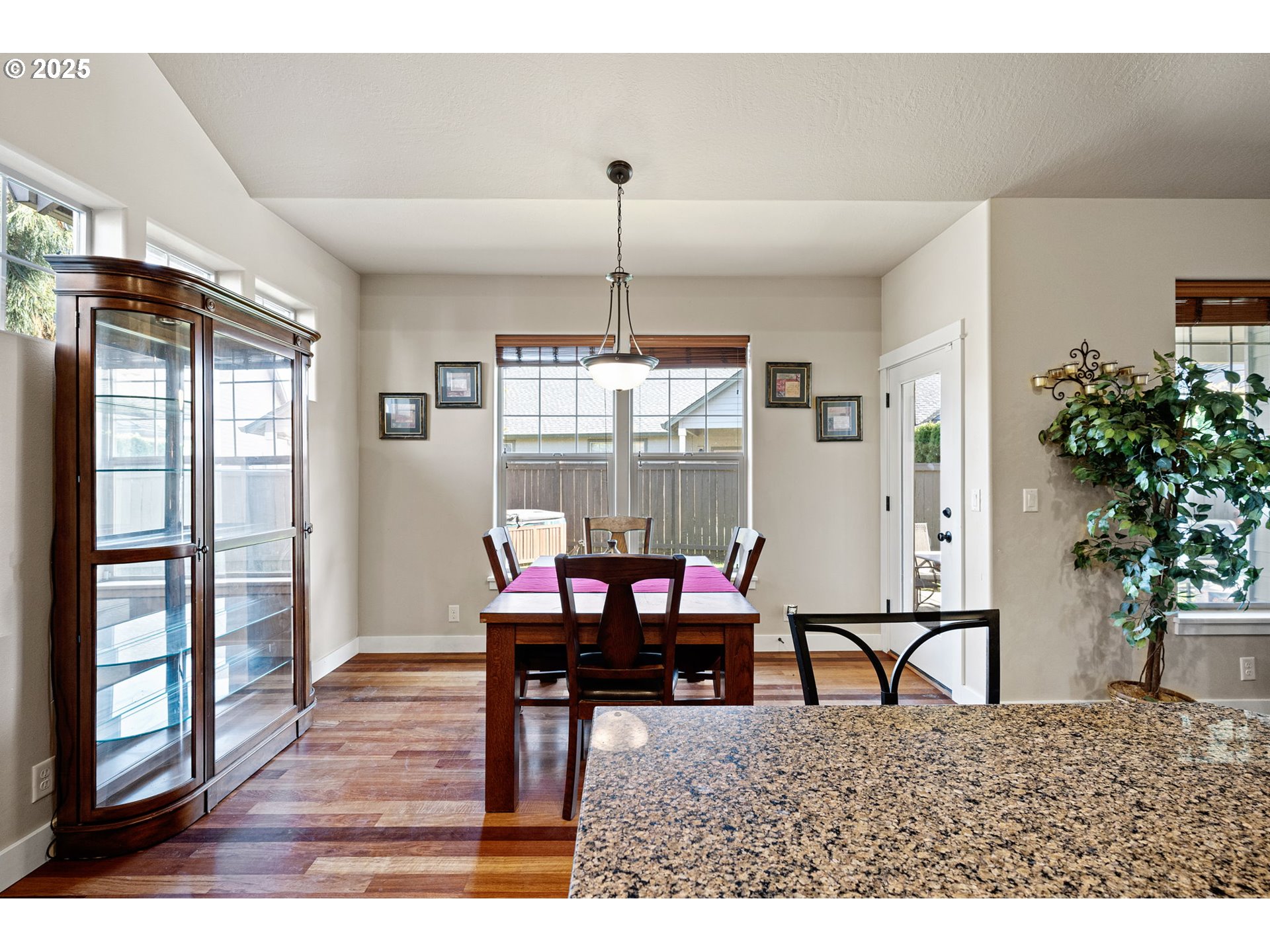 1175 South 40th Place Springfield, OR 97478 - Photo 16 of 34 a view of a dining room with furniture and window