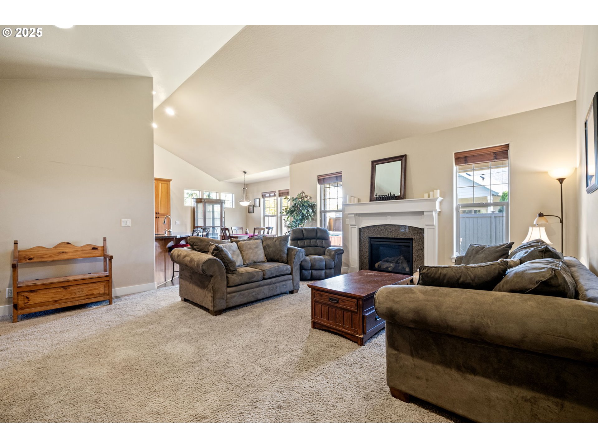 1175 South 40th Place Springfield, OR 97478 - Photo 8 of 34 a living room with furniture and a fireplace