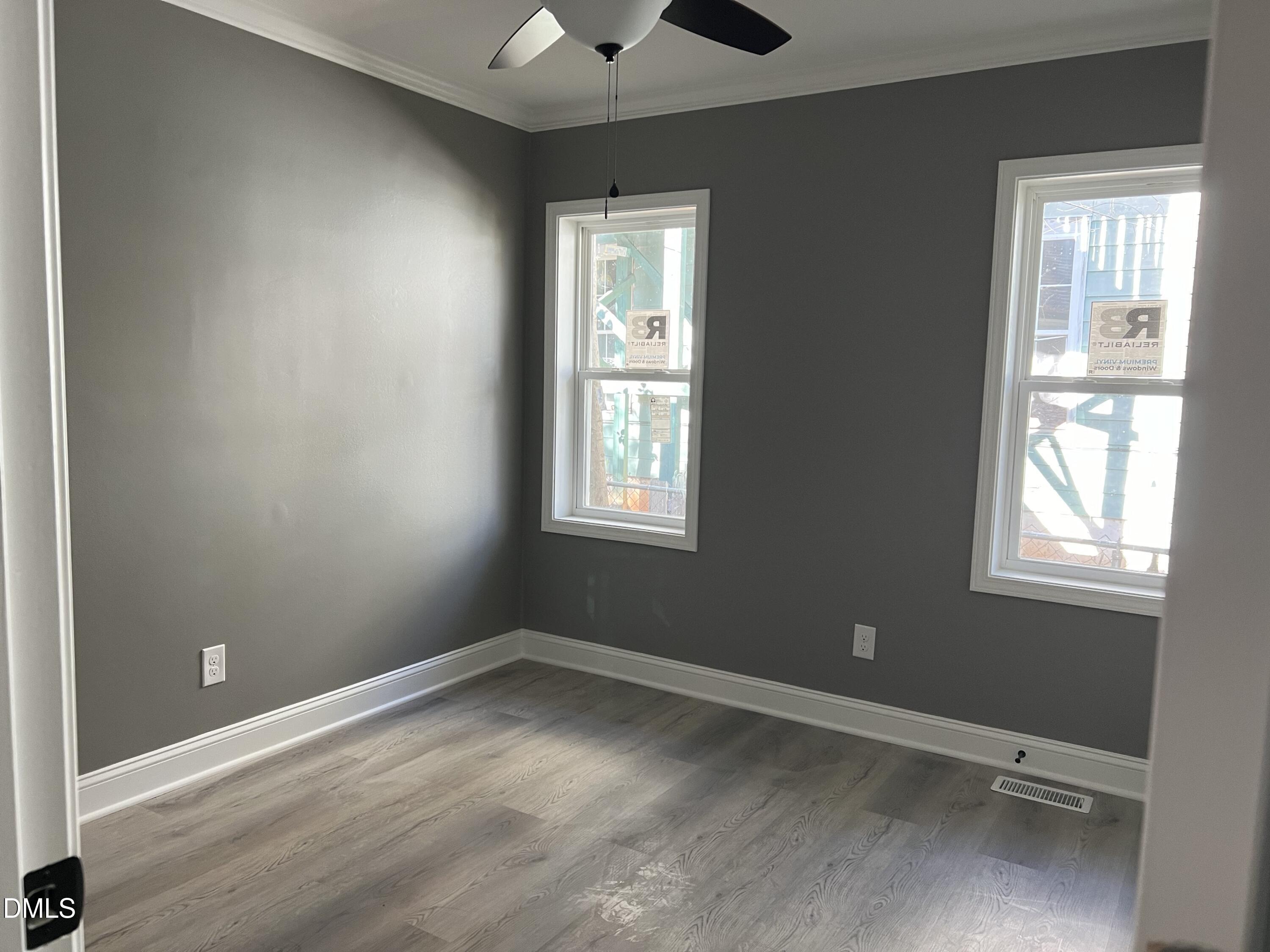 102 St Augustine Raleigh, NC 27610 - Photo 8 of 13 an empty room with a window