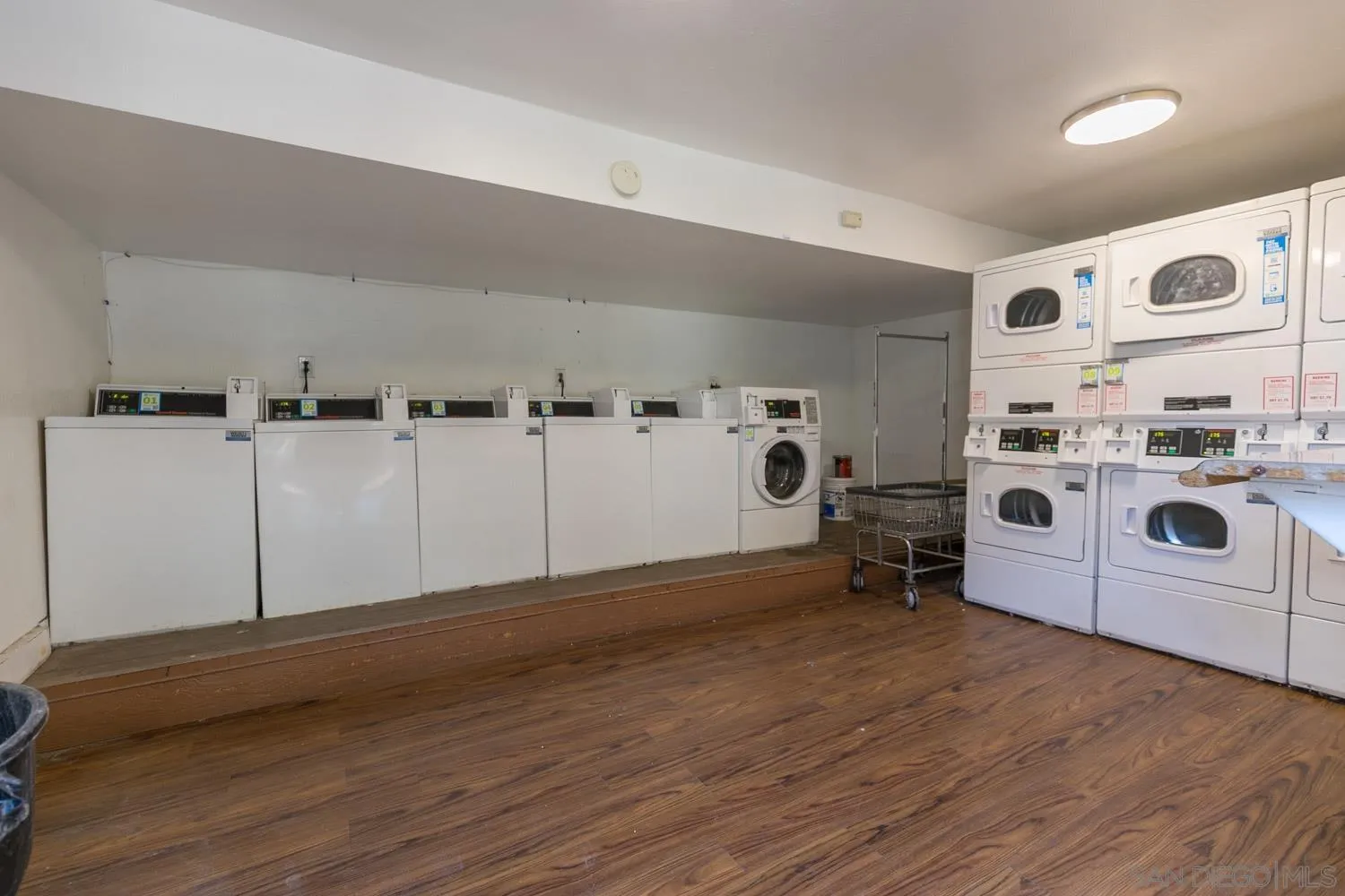 9249 Birch Street Spring Valley, CA 91977 - Photo 18 of 24 a view of a livingroom with washer and dryer