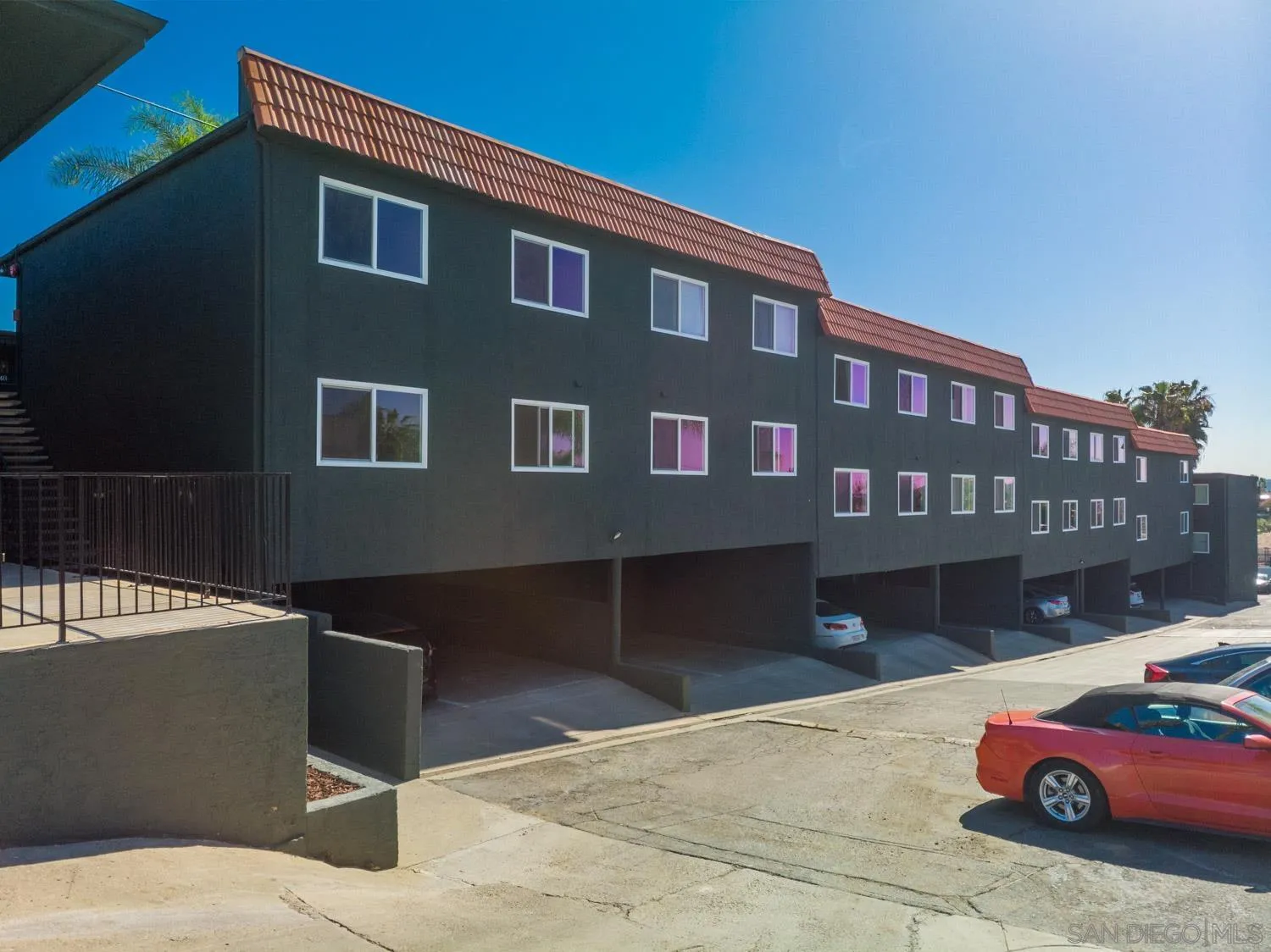 9249 Birch Street Spring Valley, CA 91977 - Photo 24 of 24 a front view of a building with parking space