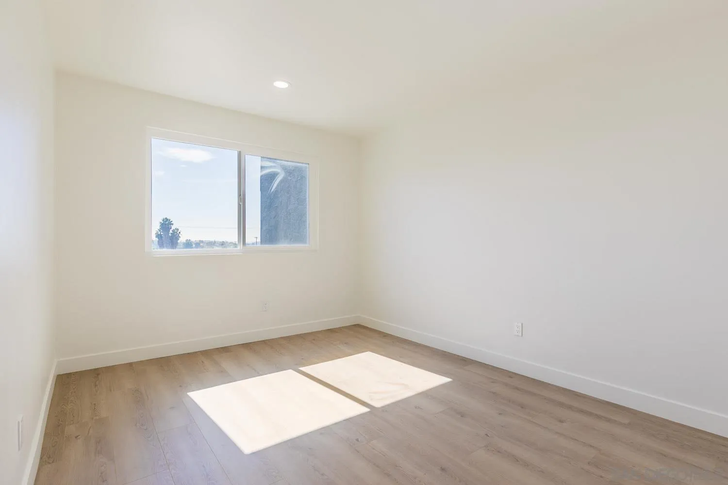 9249 Birch Street Spring Valley, CA 91977 - Photo 10 of 24 an empty room with a window
