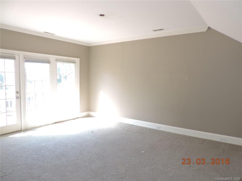 19213 Captains Watch Road Cornelius, NC 28031 - Photo 20 of 23 an empty room with a window