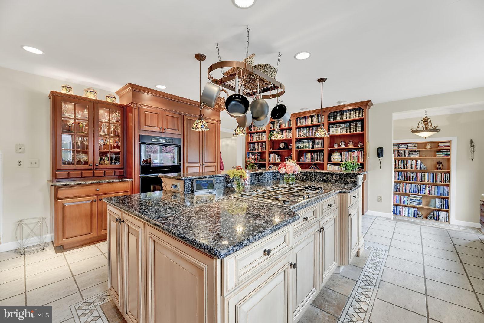 2316 Wilson Road White Hall, MD 21161 - Photo 5 of 37 a kitchen with stainless steel appliances granite countertop a sink and cabinets