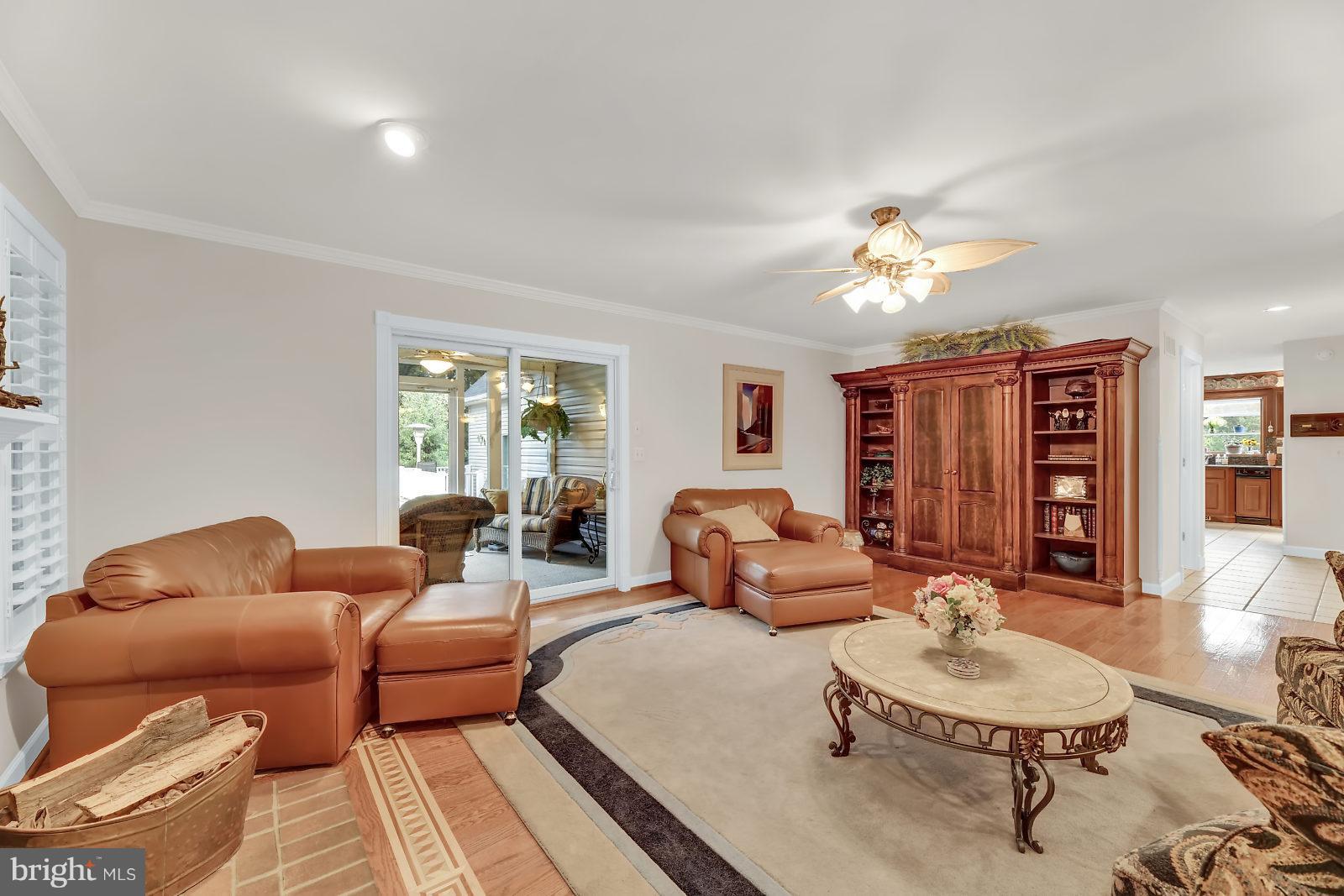 2316 Wilson Road White Hall, MD 21161 - Photo 7 of 37 a living room with furniture and a wooden floor