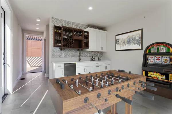 a view of balcony with furniture