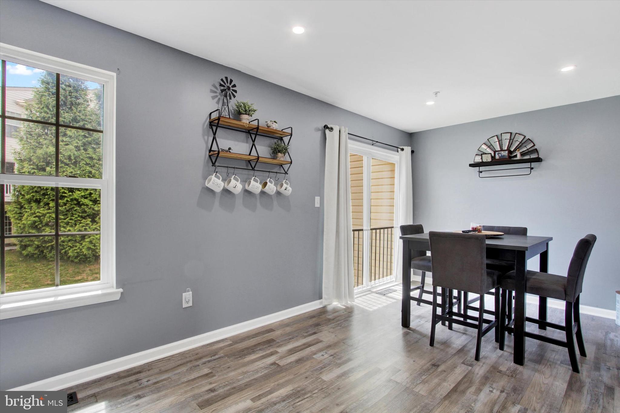703 Grant Drive Hanover, PA 17331 - Photo 15 of 27 a view of a livingroom with furniture window and wooden floor