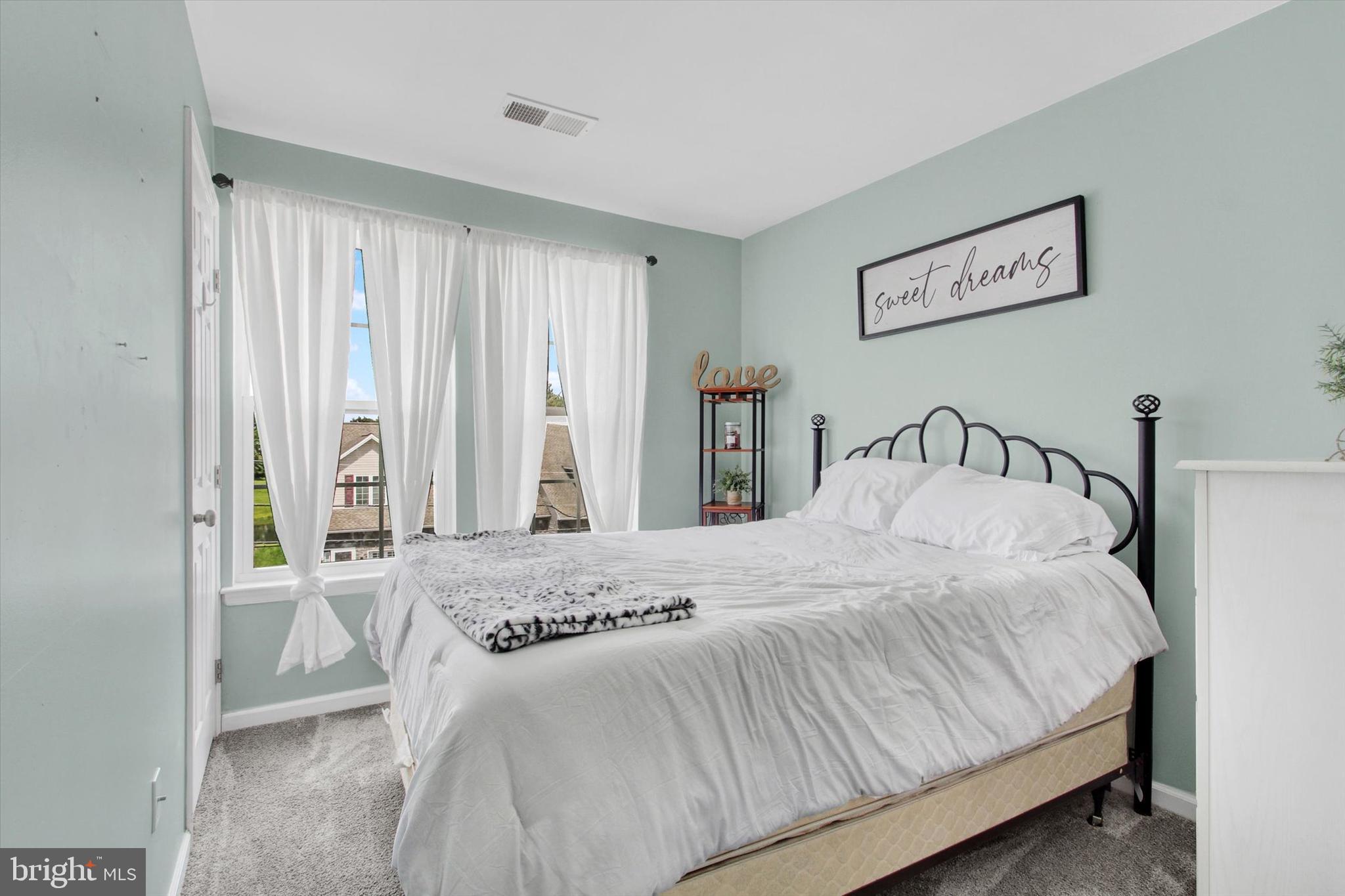 703 Grant Drive Hanover, PA 17331 - Photo 19 of 27 a bedroom with a bed and a window