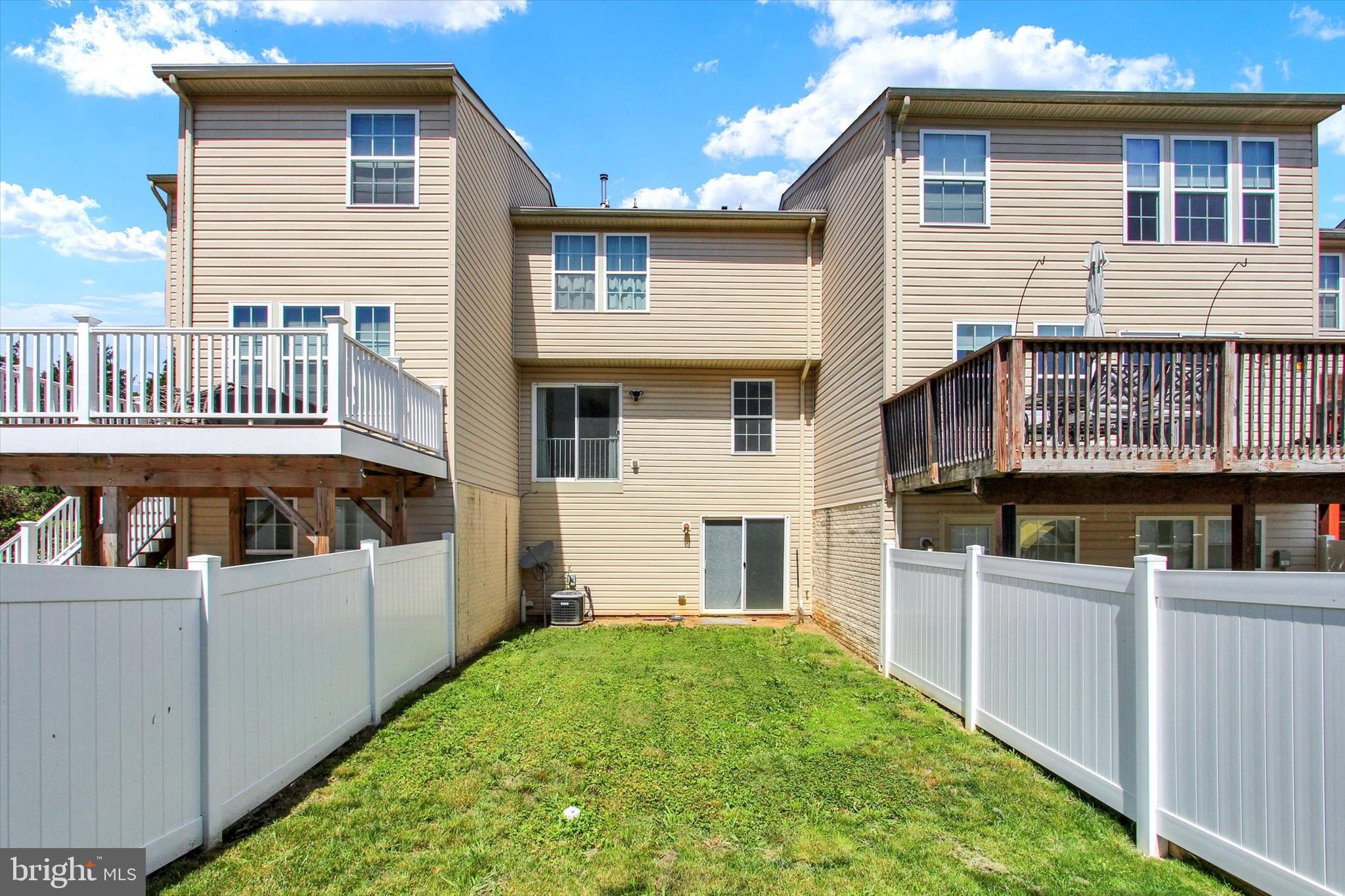 703 Grant Drive Hanover, PA 17331 - Photo 21 of 27 a view of a house with backyard and sitting area