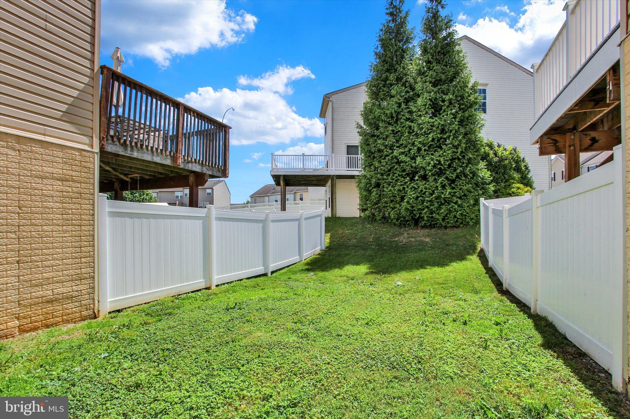 703 Grant Drive Hanover, PA 17331 - Photo 23 of 27 a view of an house with backyard and a tree