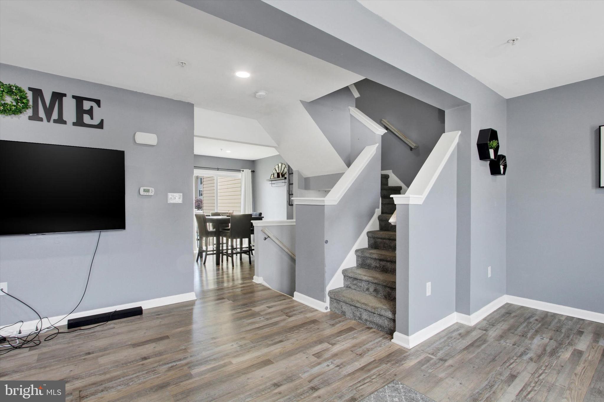 703 Grant Drive Hanover, PA 17331 - Photo 9 of 27 a view of a livingroom with wooden floor and furniture