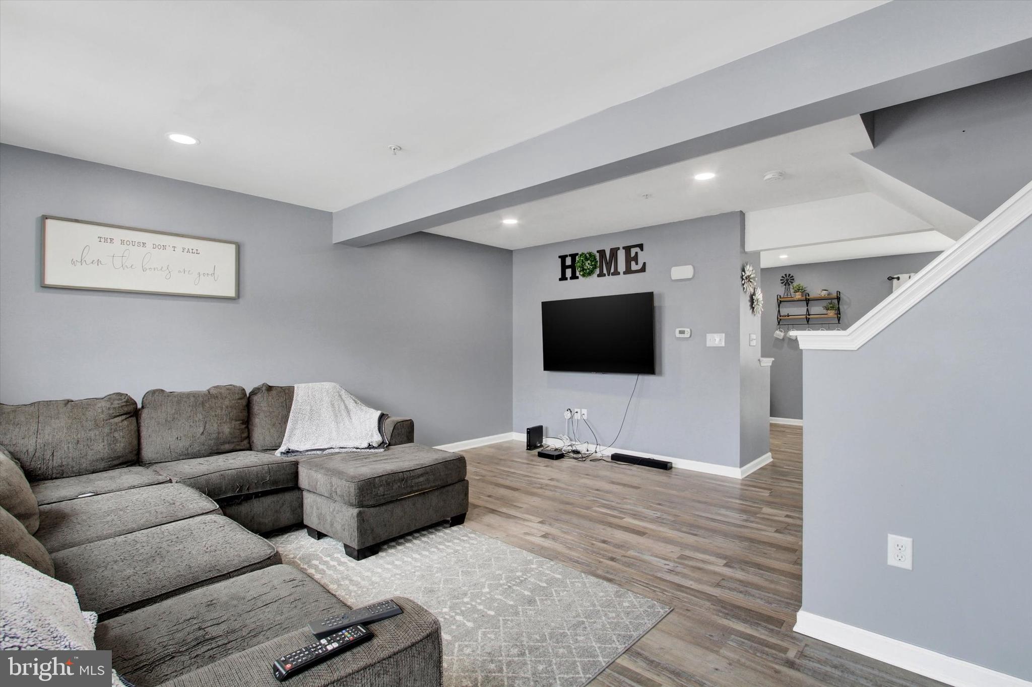 703 Grant Drive Hanover, PA 17331 - Photo 10 of 27 a living room with furniture and a flat screen tv