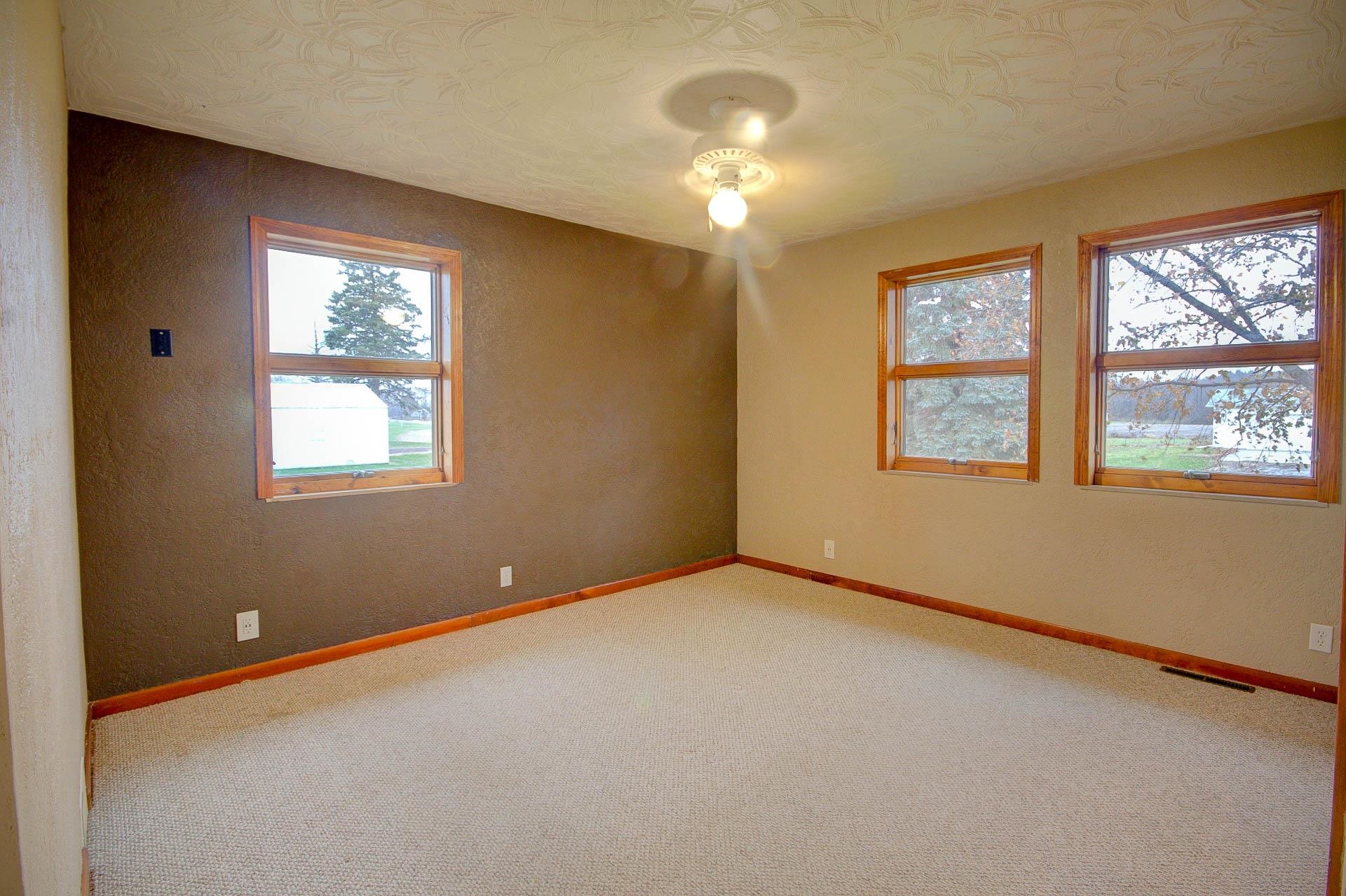327 4th Street Andover, IL 61233 - Photo 27 of 58 a view of an empty room with a window