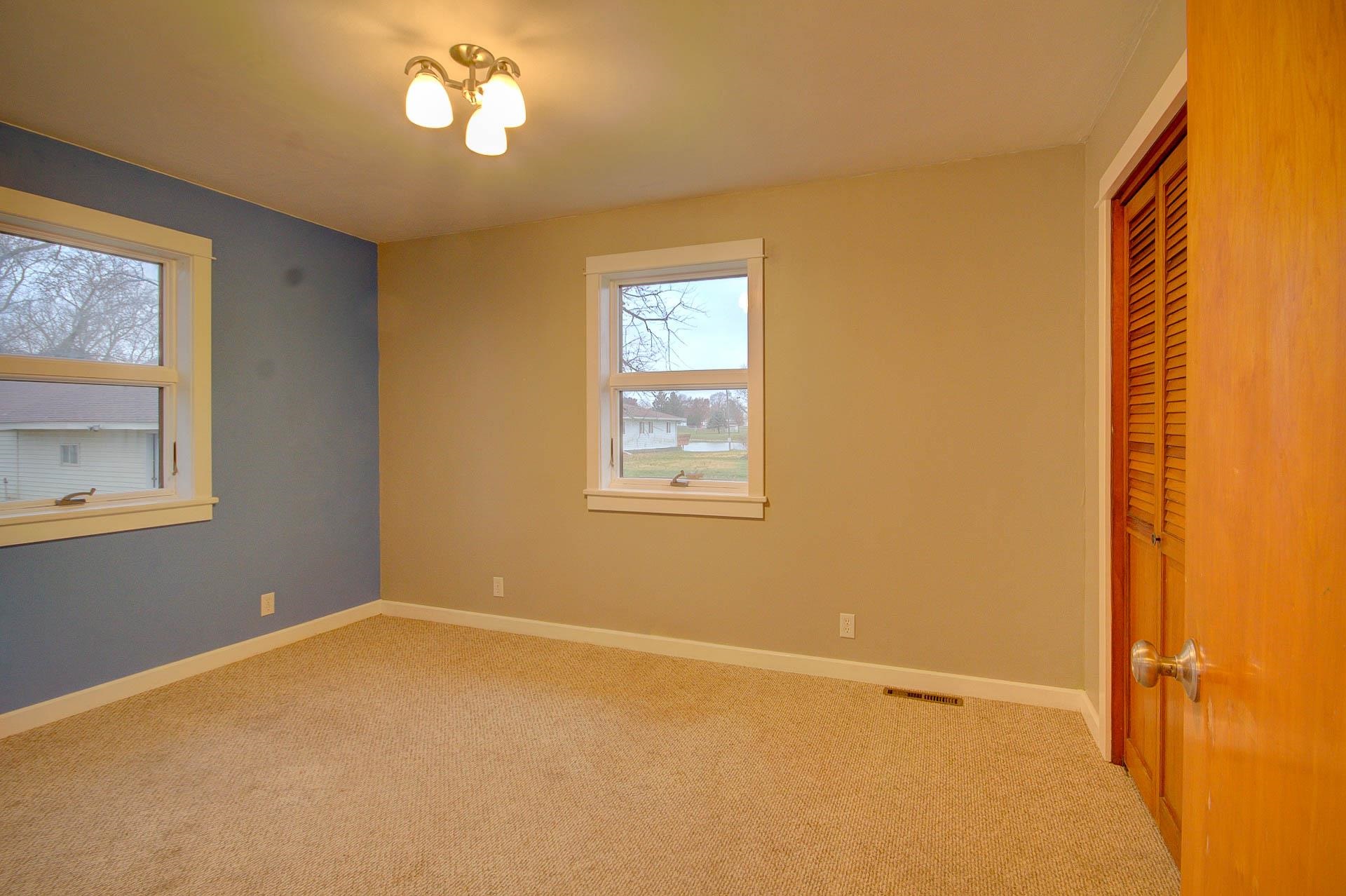 327 4th Street Andover, IL 61233 - Photo 31 of 58 a view of an empty room with a window