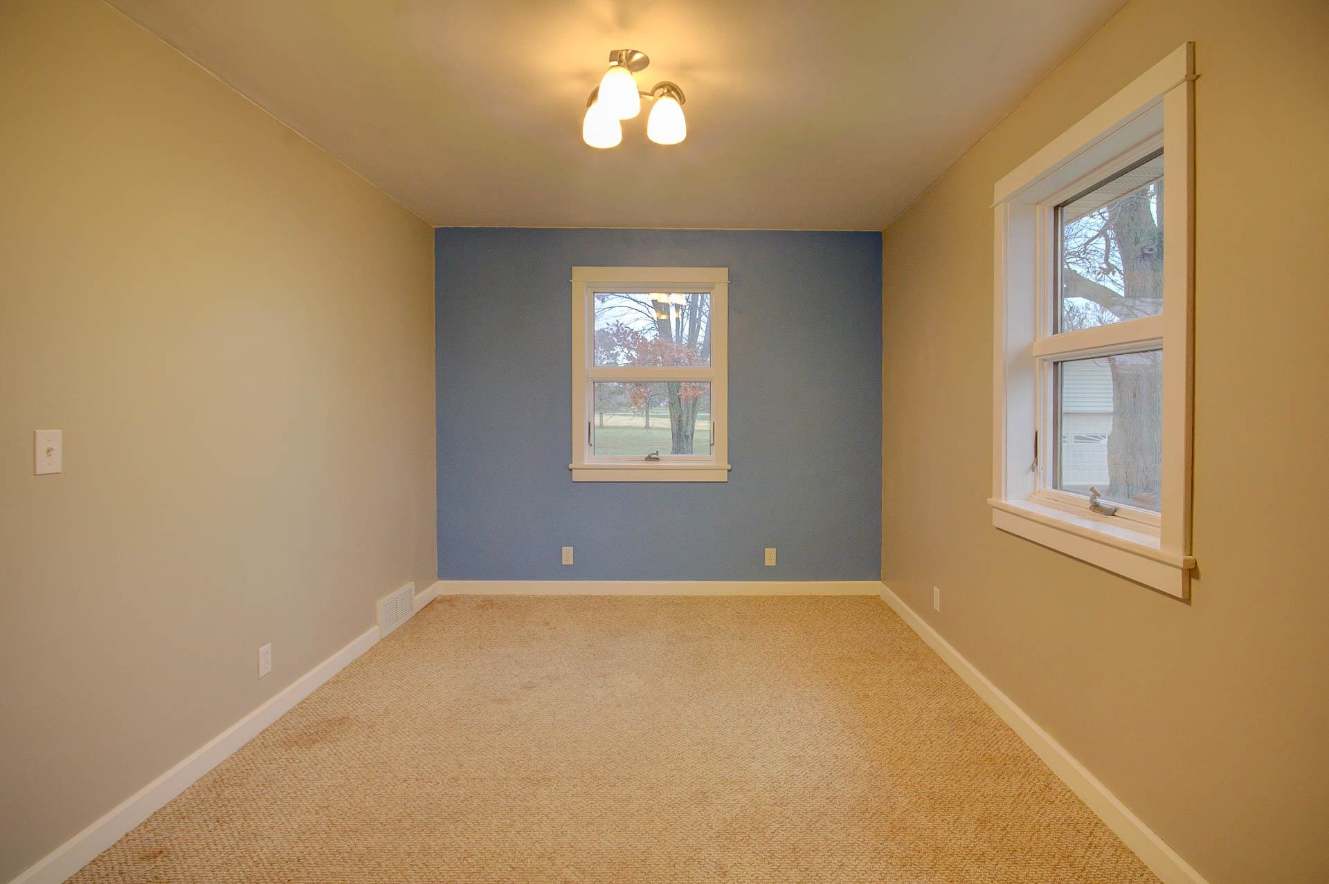 327 4th Street Andover, IL 61233 - Photo 33 of 58 an empty room with windows