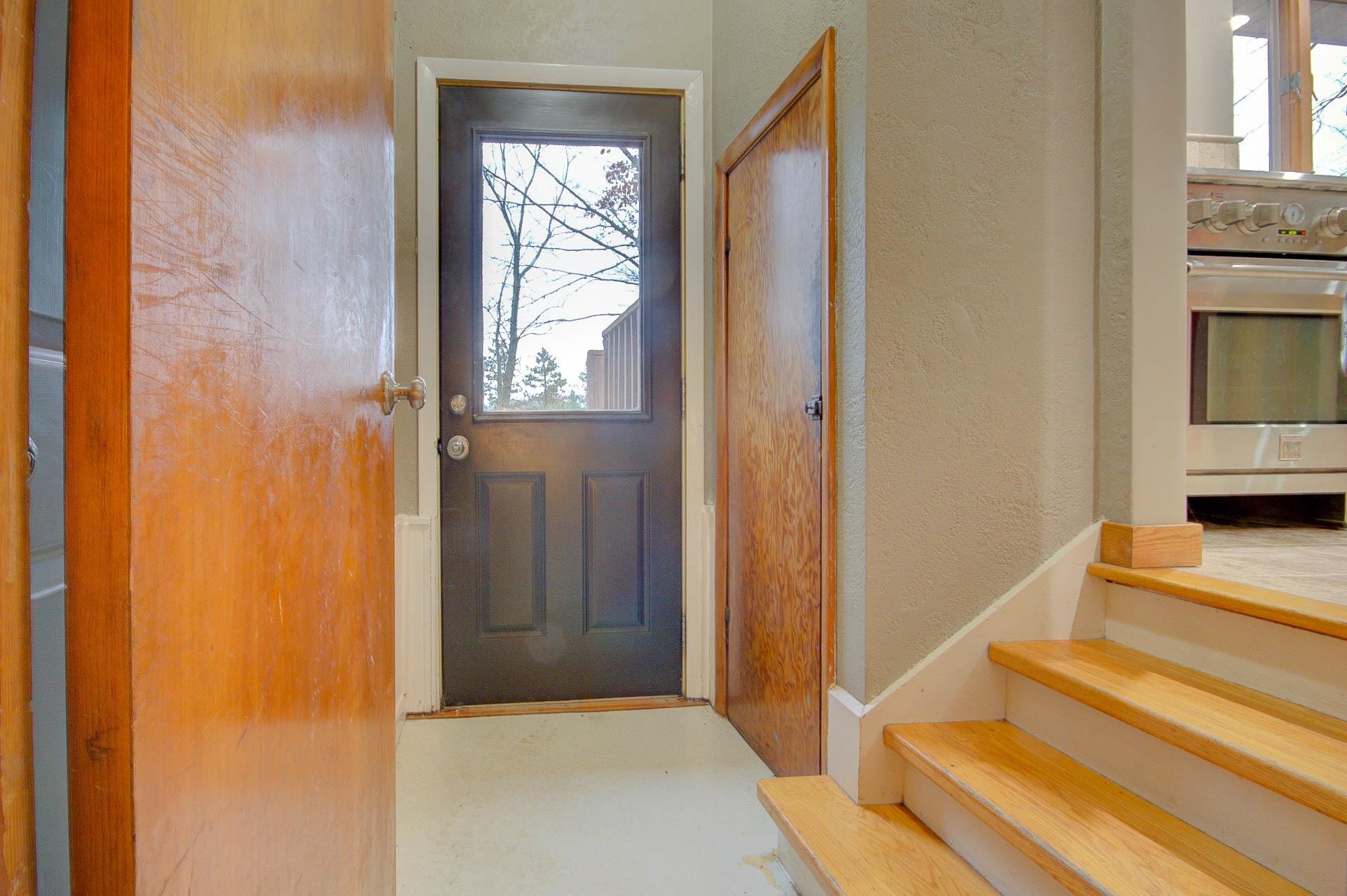 327 4th Street Andover, IL 61233 - Photo 50 of 58 a view of front door with wooden floor