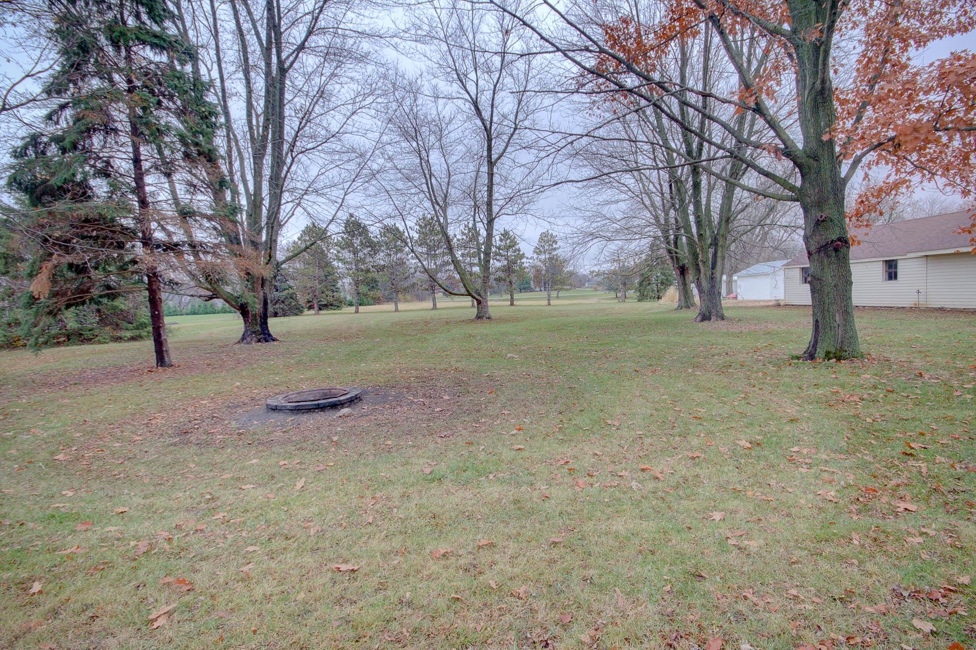 327 4th Street Andover, IL 61233 - Photo 10 of 58 a view of outdoor space with trees