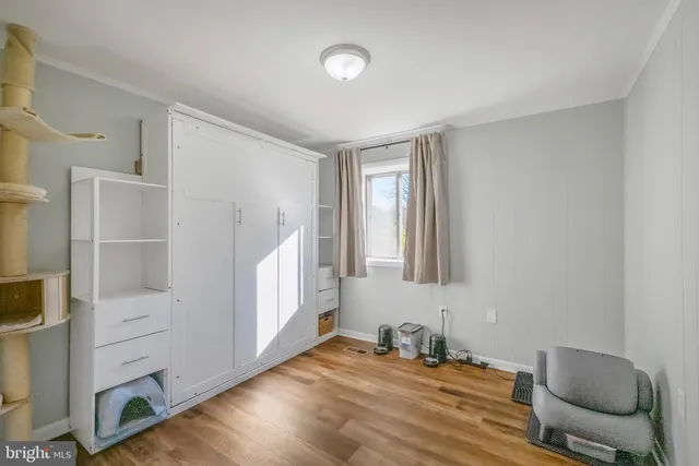 a room with furniture and a chair