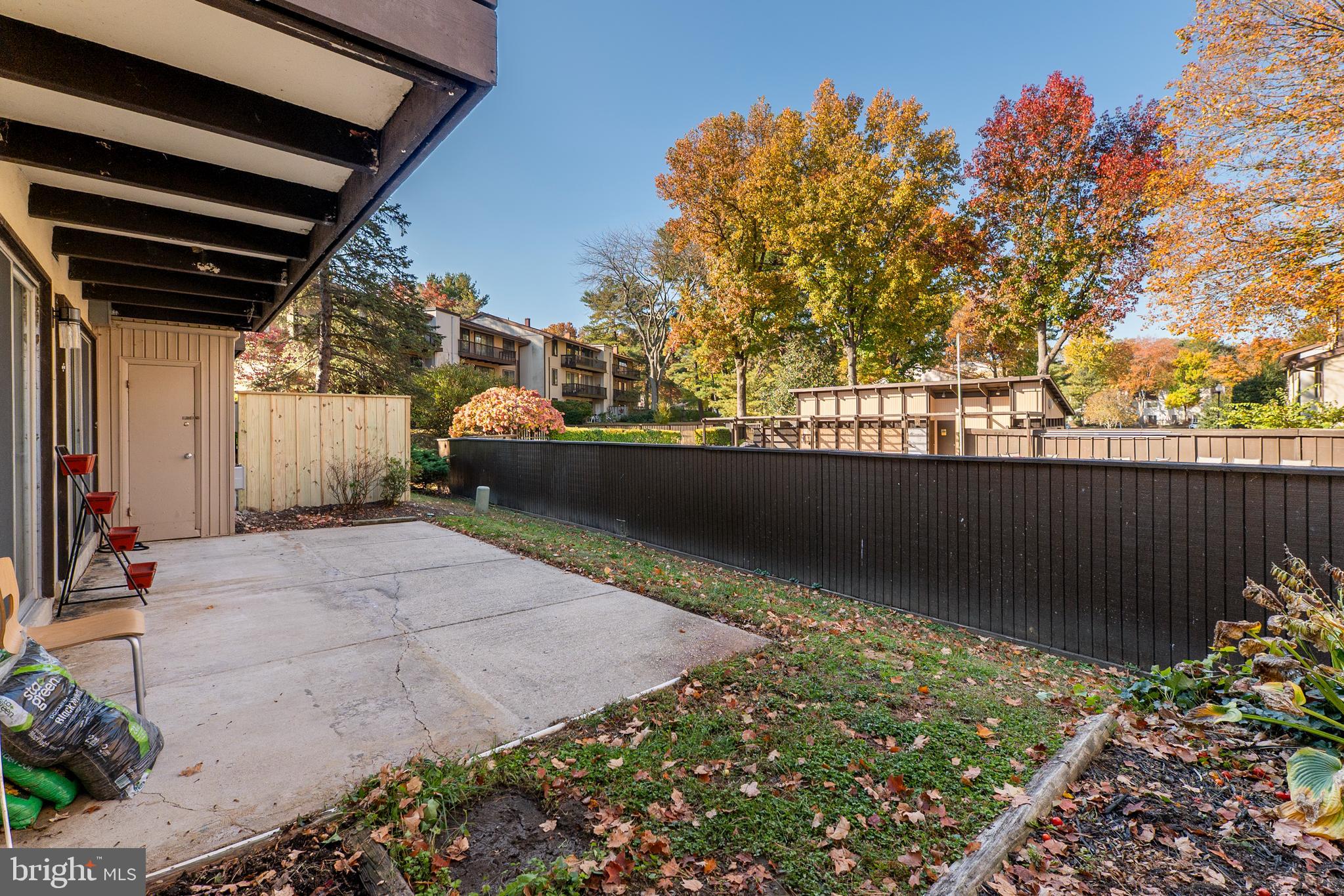 10067 Windstream Drive, Unit 2 Columbia, MD 21044 - Photo 26 of 30 a view of a backyard
