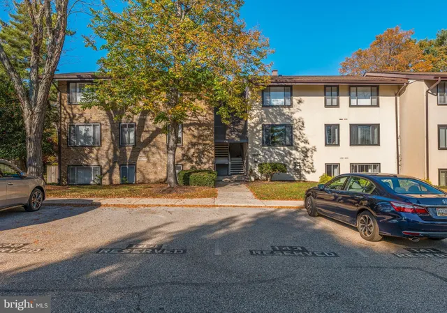 a view of street with parked cars
