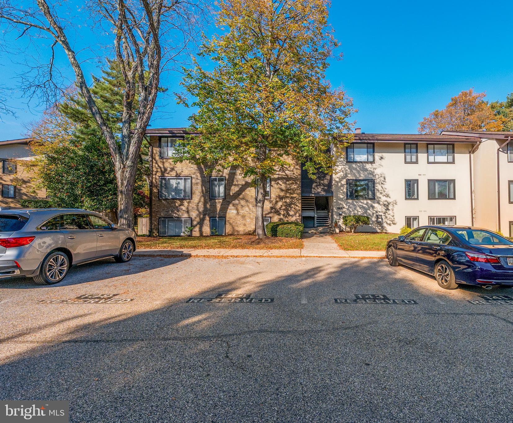 10067 Windstream Drive, Unit 2 Columbia, MD 21044 - Photo 28 of 30 a view of street with parked cars