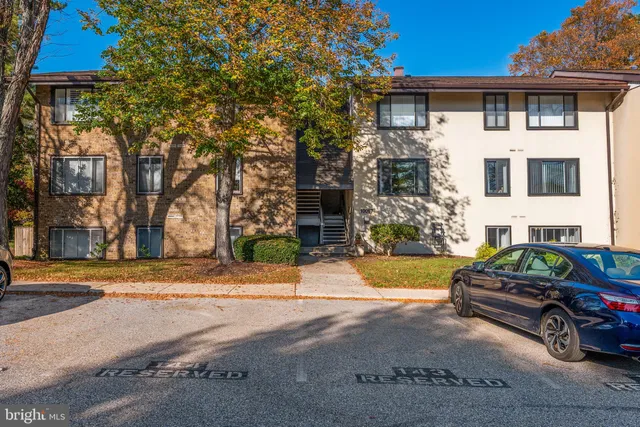 a car parked in front of a house