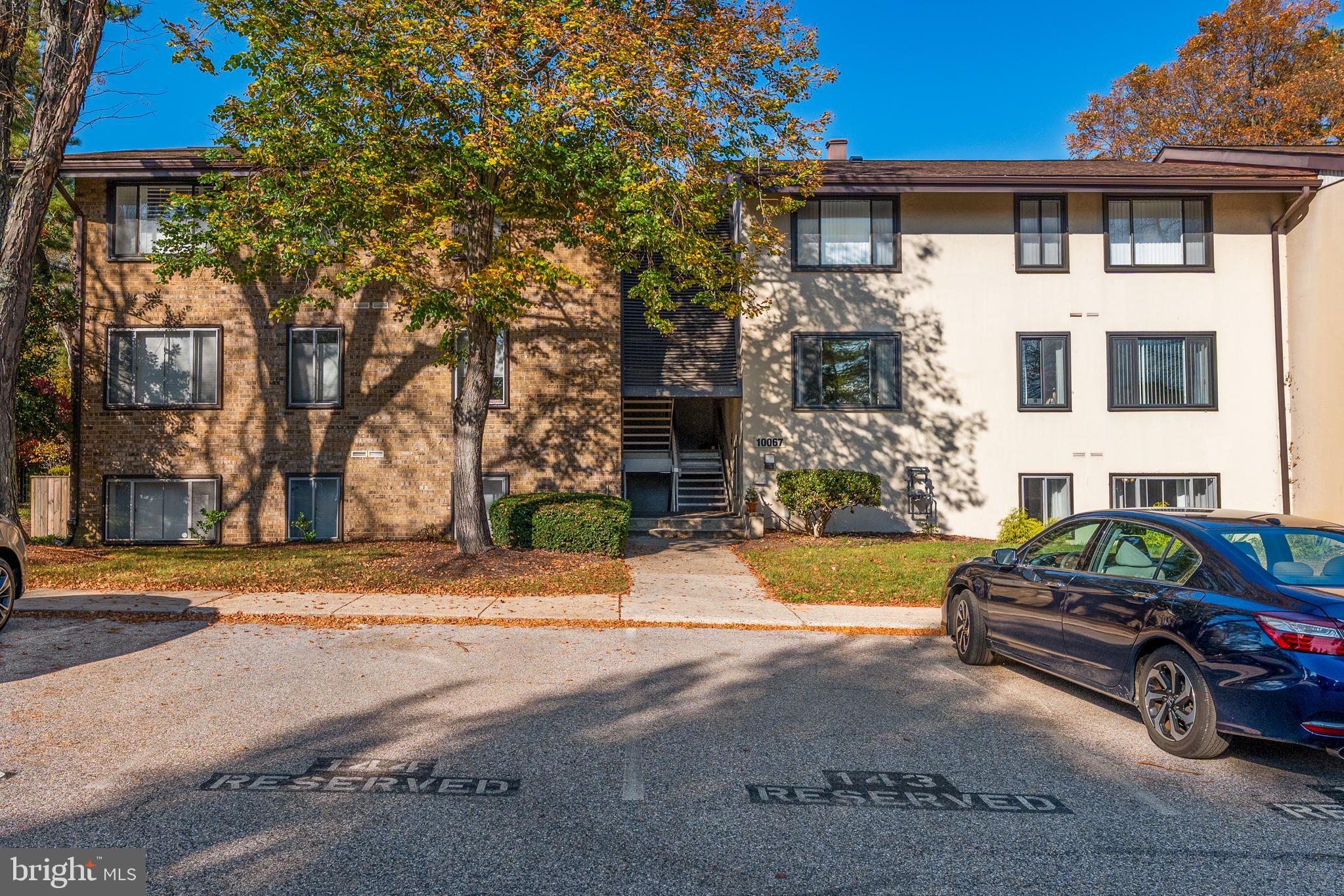 10067 Windstream Drive, Unit 2 Columbia, MD 21044 - Photo 29 of 30 a car parked in front of a house