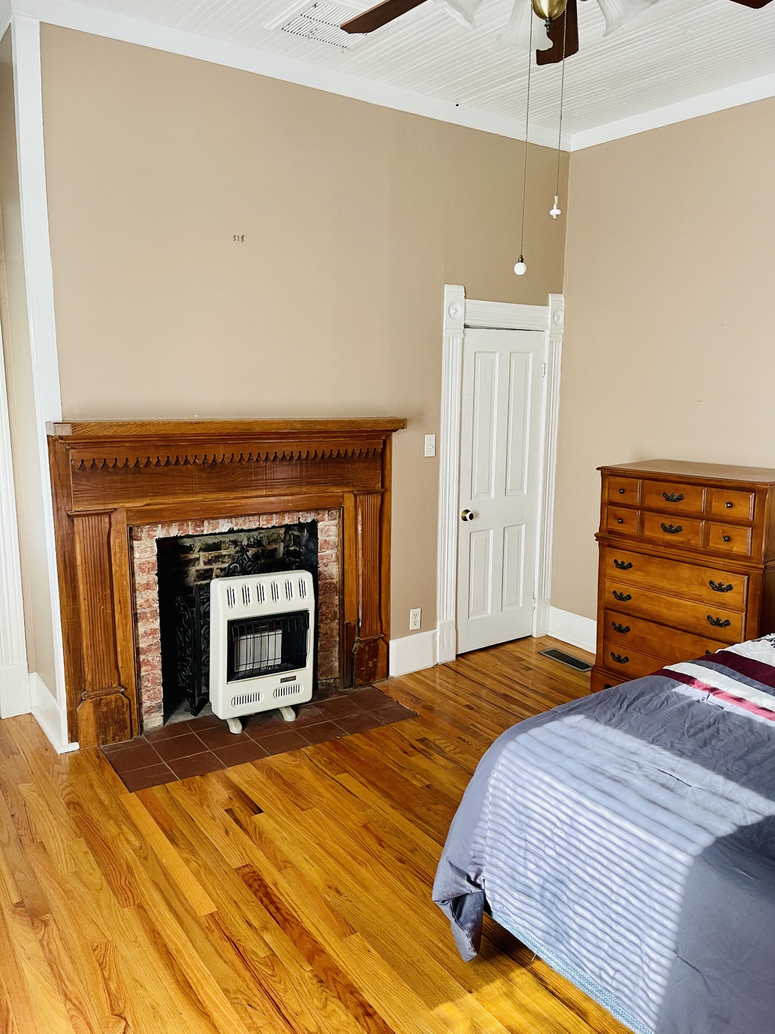 830 Red Hill Road Normandy, TN 37360 - Photo 17 of 56 a bedroom with a bed and a fireplace