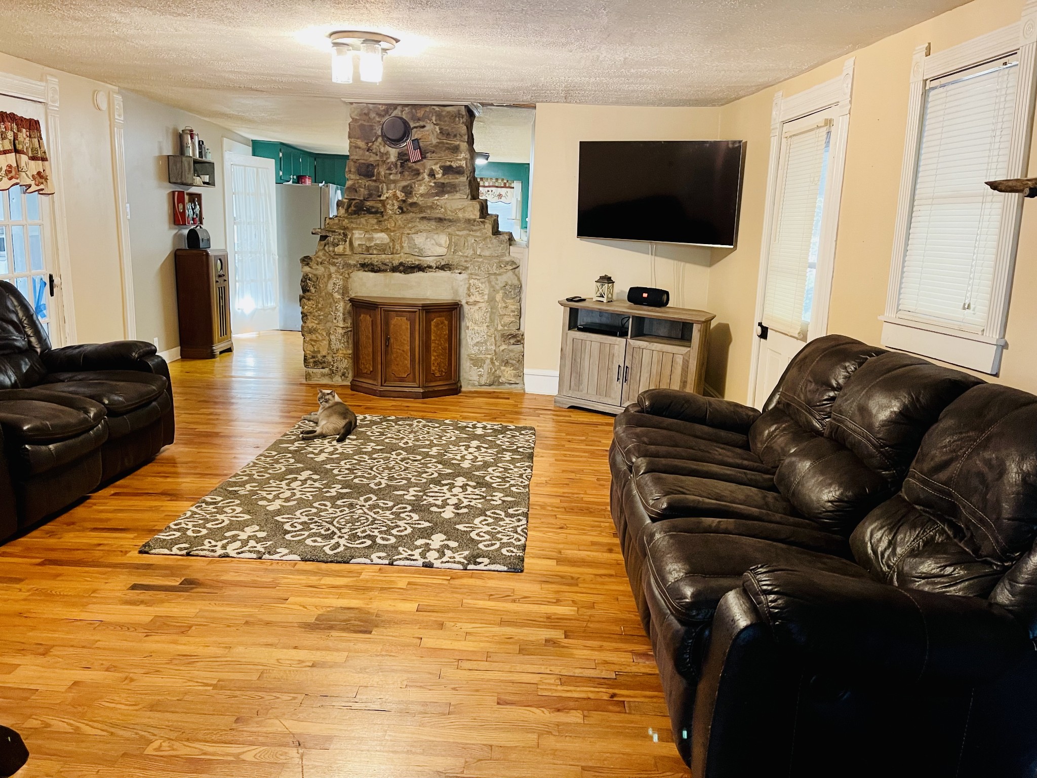 830 Red Hill Road Normandy, TN 37360 - Photo 23 of 56 a living room with furniture and a flat screen tv