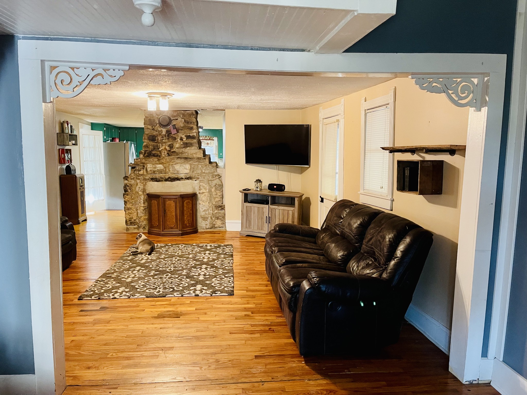 830 Red Hill Road Normandy, TN 37360 - Photo 24 of 56 a living room with furniture and a flat screen tv