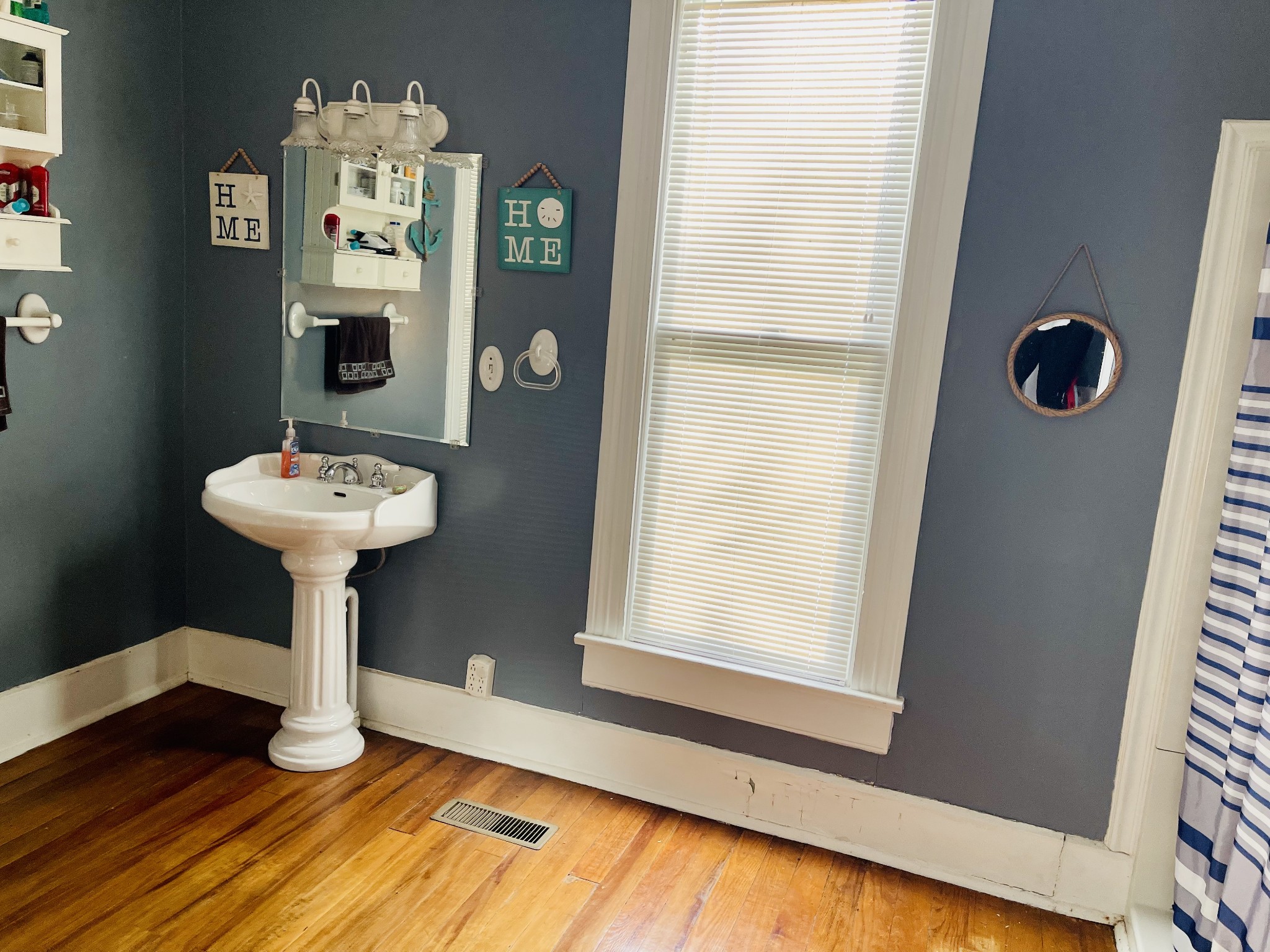830 Red Hill Road Normandy, TN 37360 - Photo 26 of 56 a bathroom with a sink and a mirror