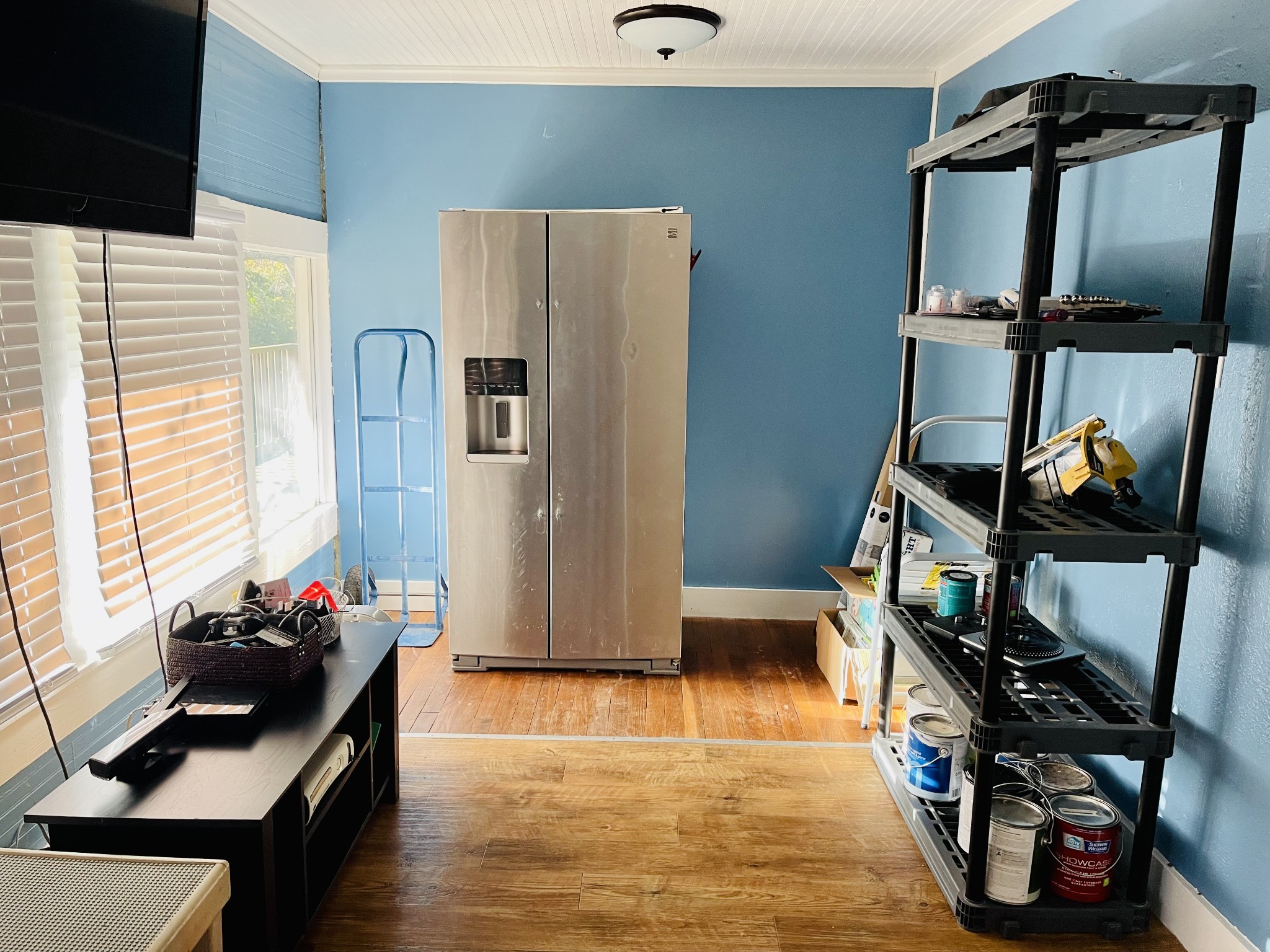 830 Red Hill Road Normandy, TN 37360 - Photo 28 of 56 a kitchen with stainless steel appliances a stove a refrigerator and a wooden floor