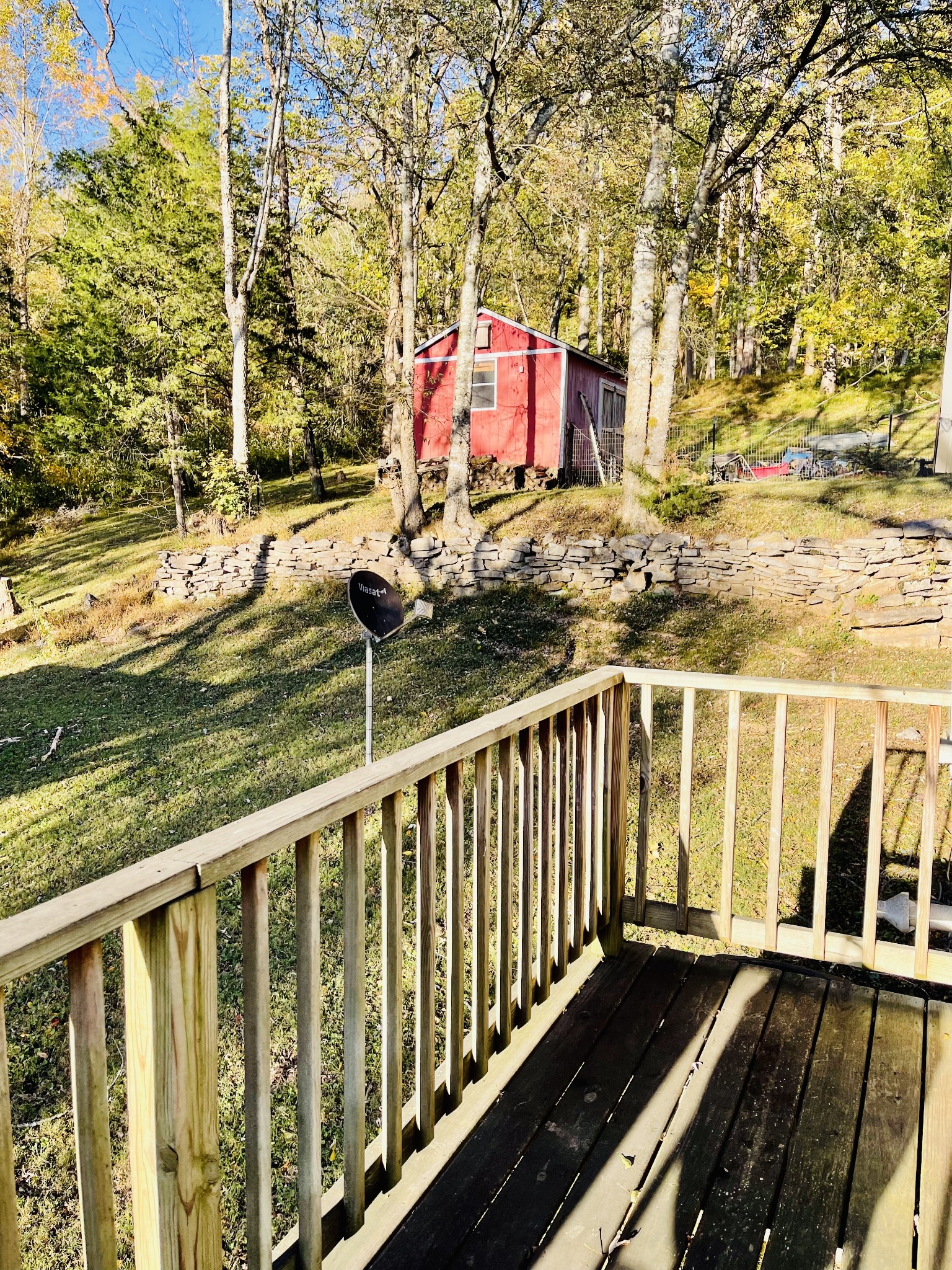 830 Red Hill Road Normandy, TN 37360 - Photo 53 of 56 a view of a balcony with wooden floor and fence