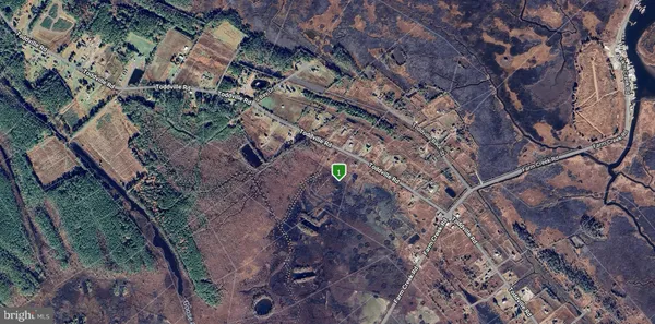a view of aerial view of a house with a yard