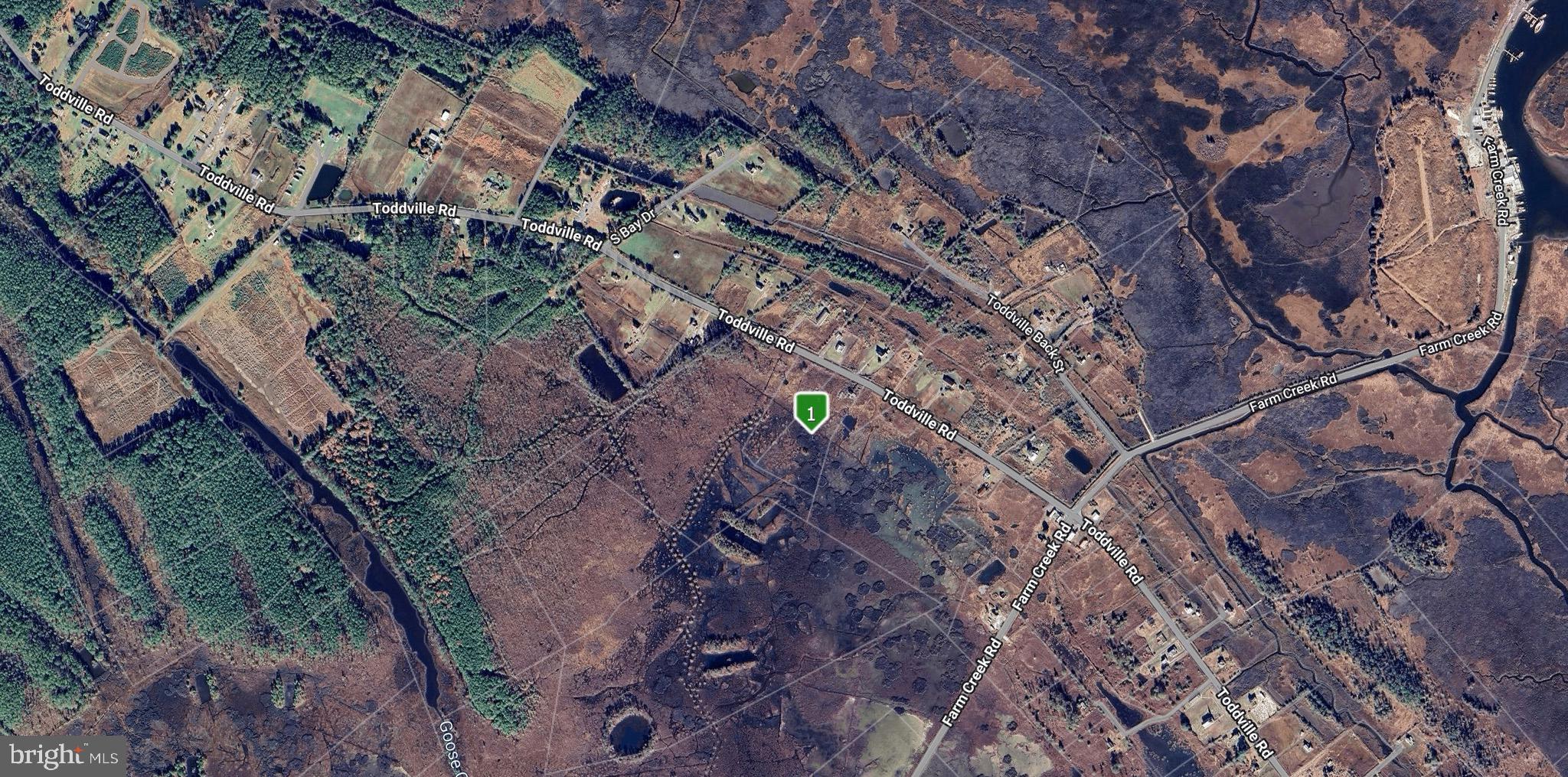 a view of aerial view of a house with a yard