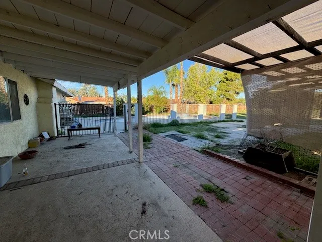 a view of a porch with hardwood