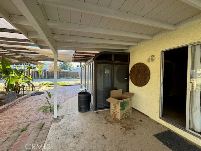 a view of a porch with chairs