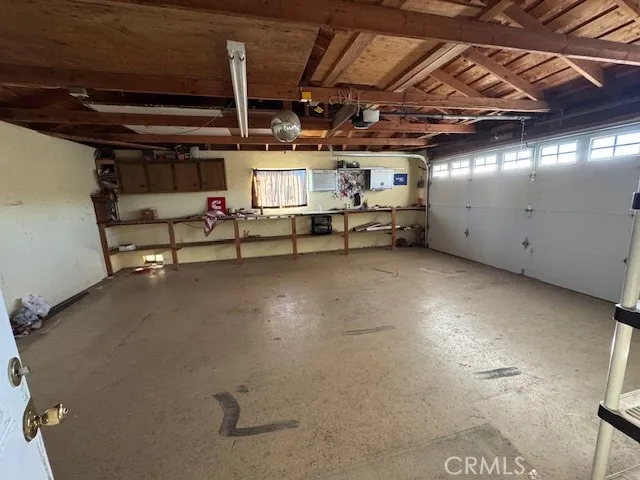 a view of room with gym equipment