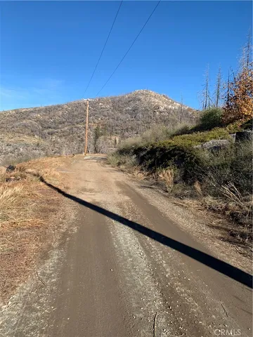a view of a road with an ocean view