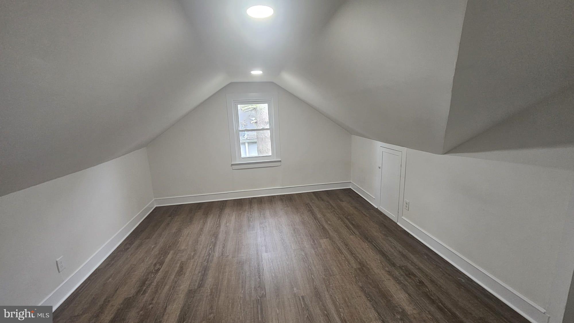 471 Glassboro Road Woodbury Heights, NJ 08097 - Photo 19 of 21 an empty room with wooden floor and windows