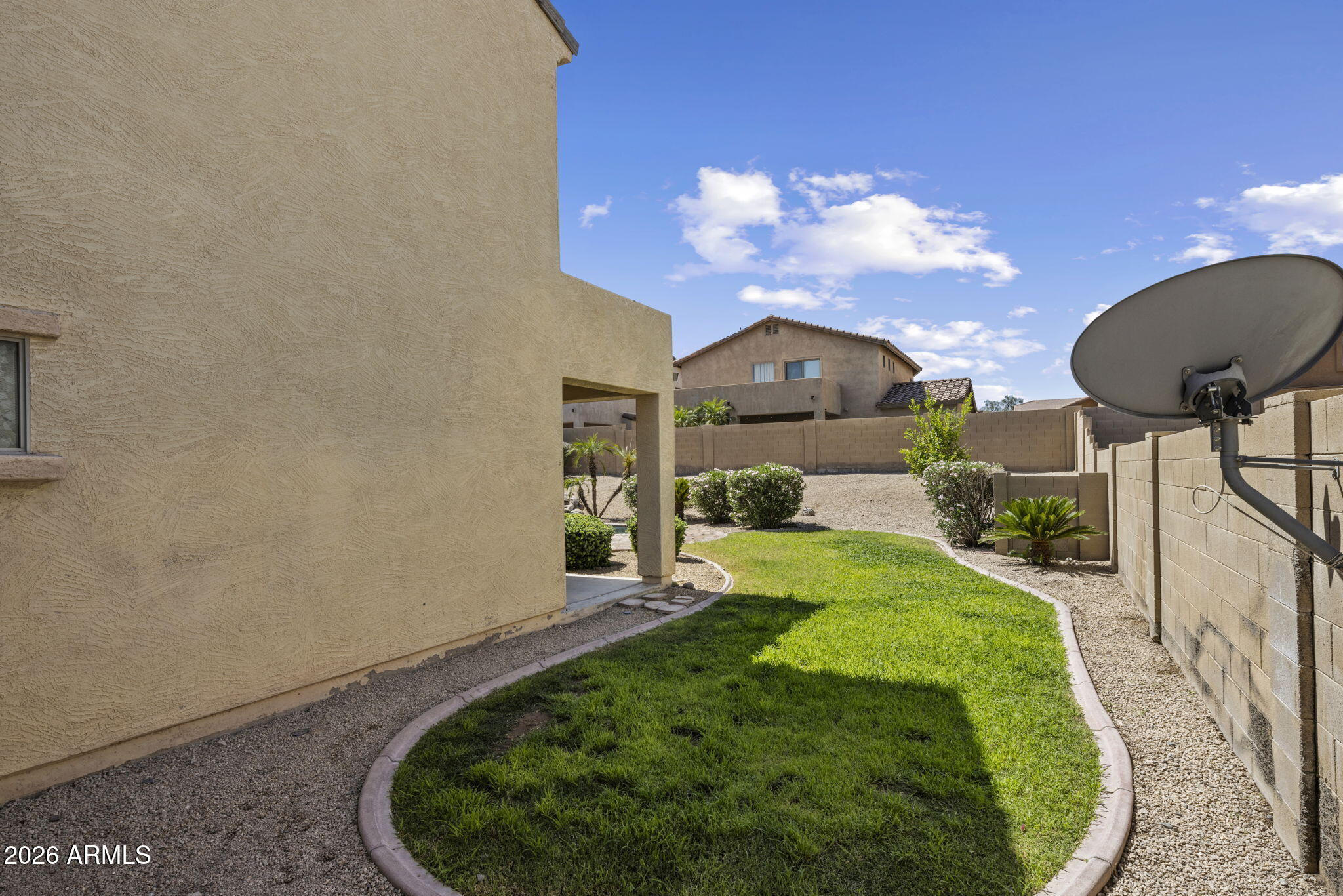 5121 West Beverly Road Laveen, AZ 85339 - Photo 10 of 32 a view of a garden with a slide