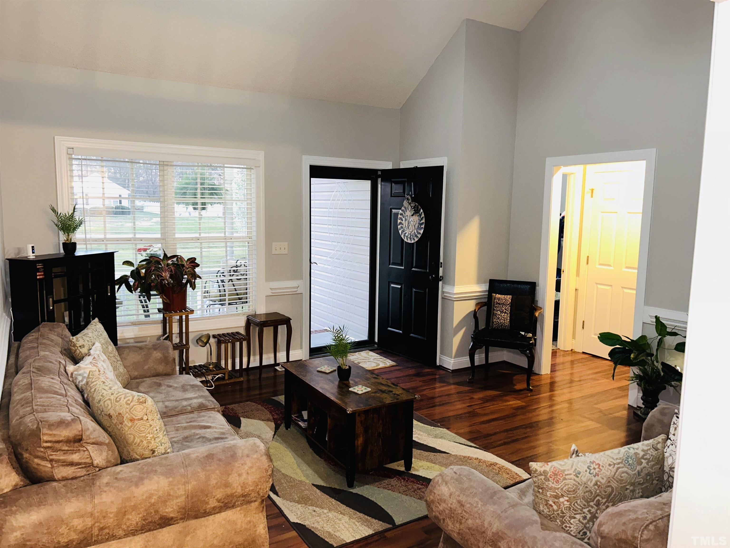 5524 Scuppernong Road Wilson, NC 27893 - Photo 12 of 37 a living room with furniture and wooden floor