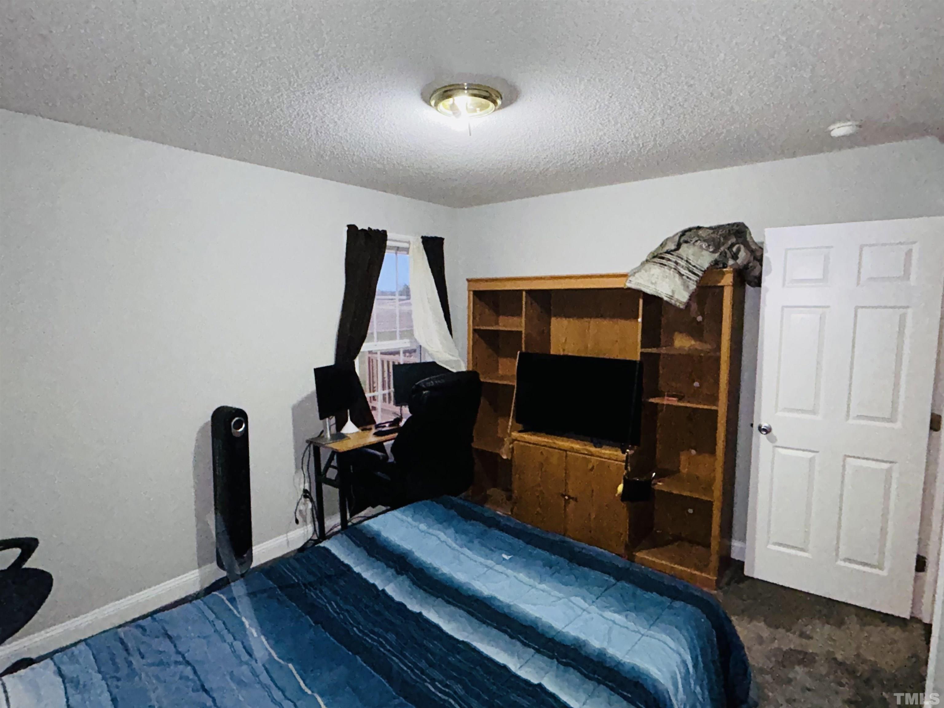 5524 Scuppernong Road Wilson, NC 27893 - Photo 24 of 37 a view of a room with gym equipment