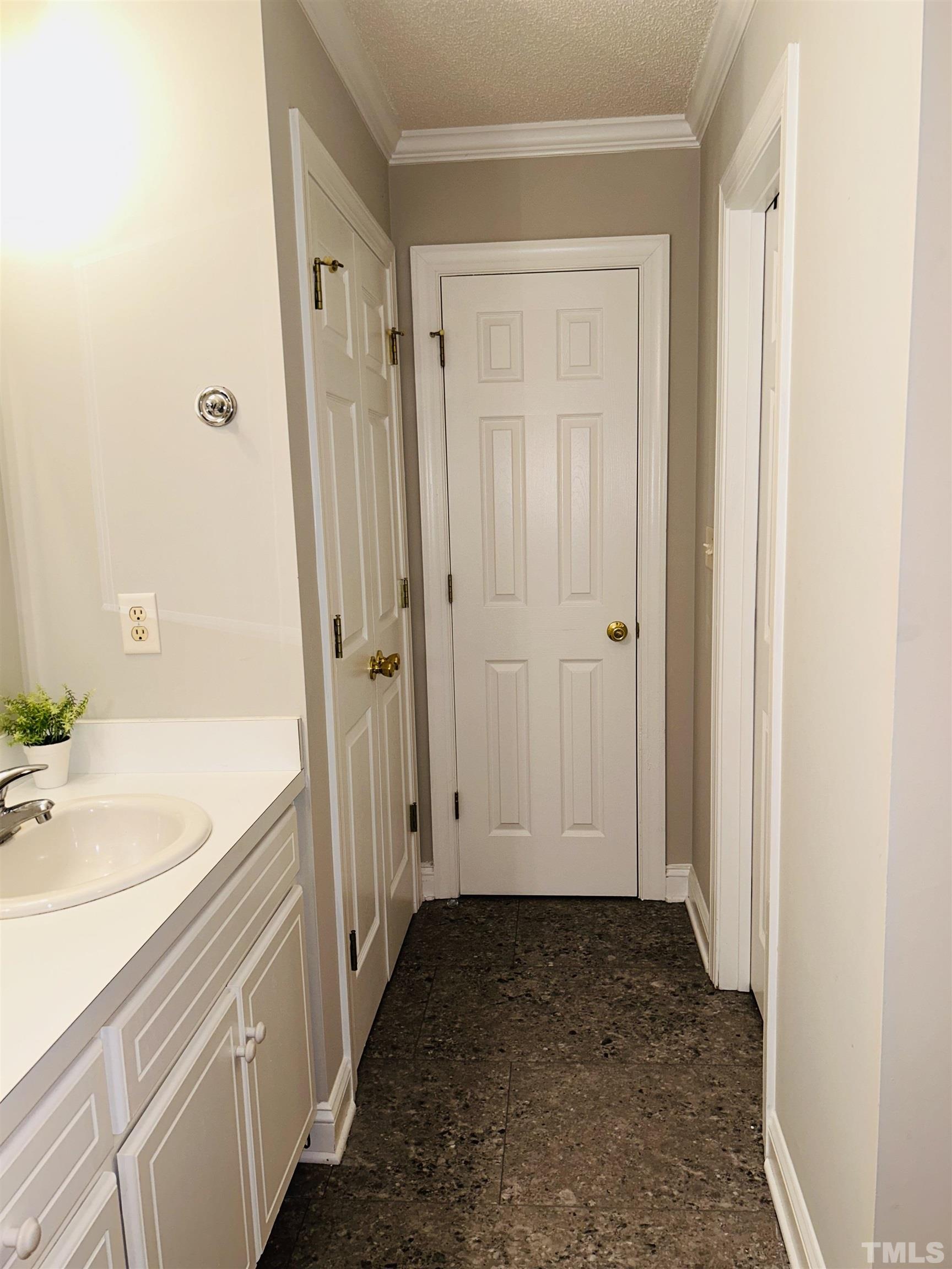 5524 Scuppernong Road Wilson, NC 27893 - Photo 32 of 37 a bathroom with a granite countertop sink and a mirror