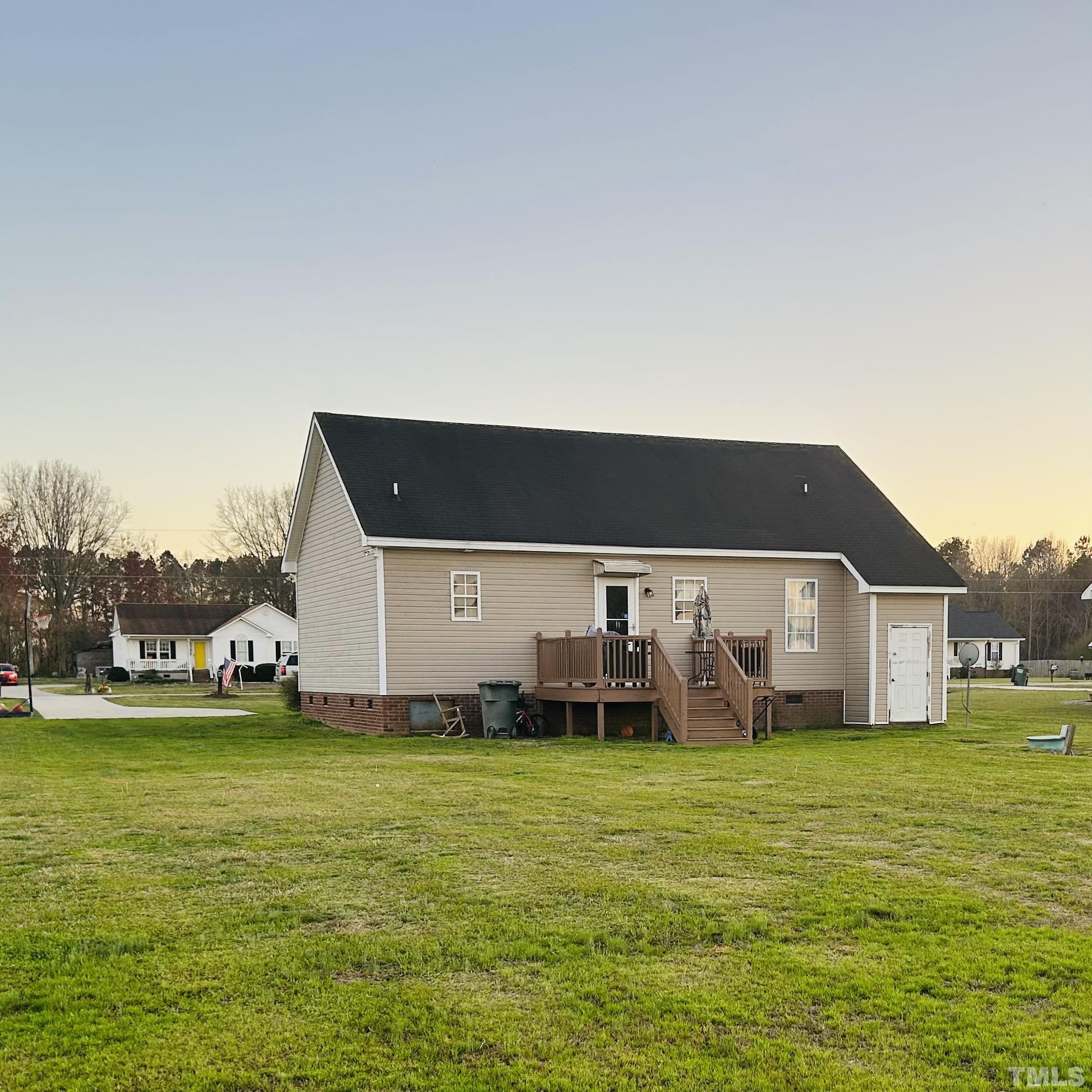 5524 Scuppernong Road Wilson, NC 27893 - Photo 8 of 37 a view of a house with yard and sitting area